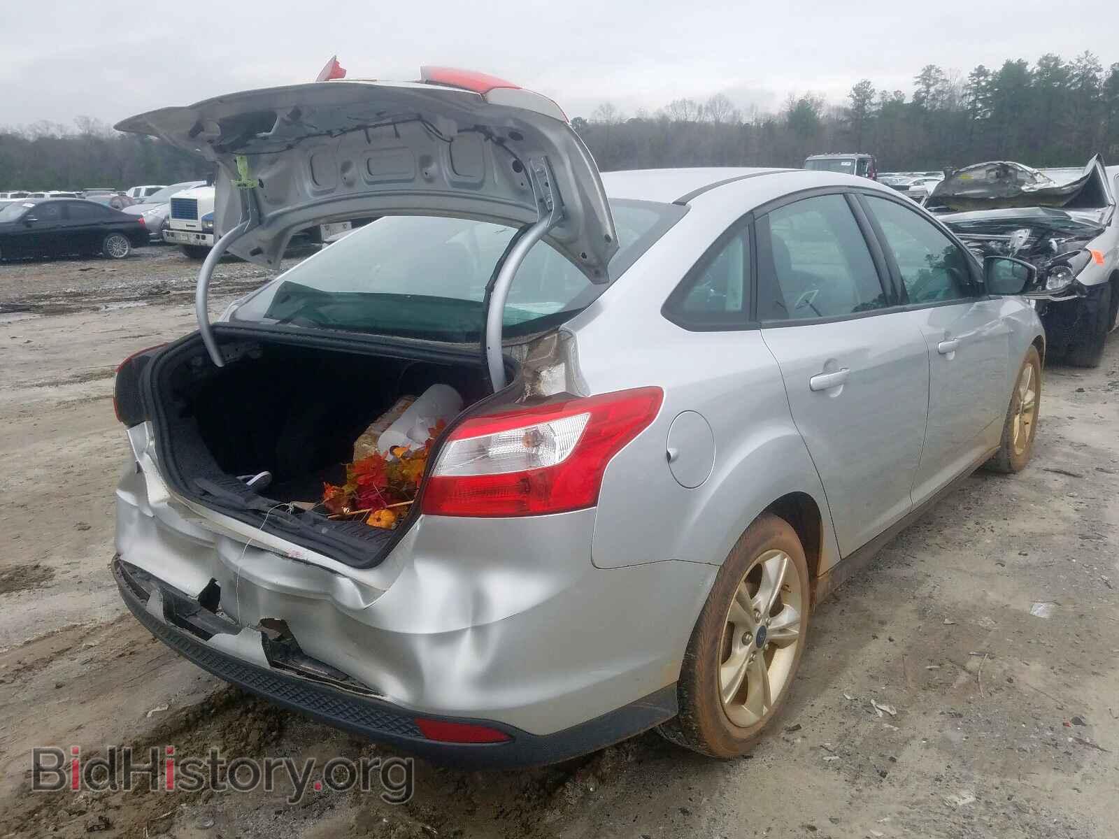 2014 FORD FOCUS - VIN: 1FADP3F2XEL319523 - Photo 4