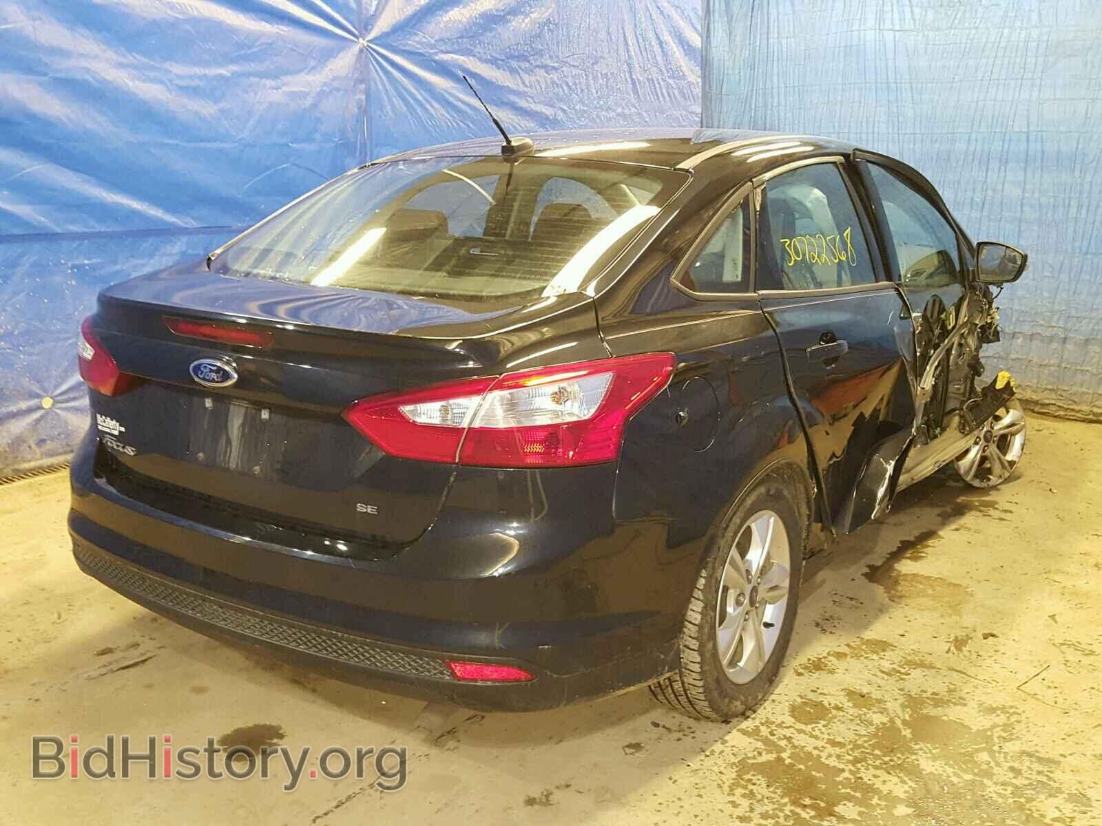 2014 FORD FOCUS - VIN: 1FADP3F21EL141551 - Photo 4