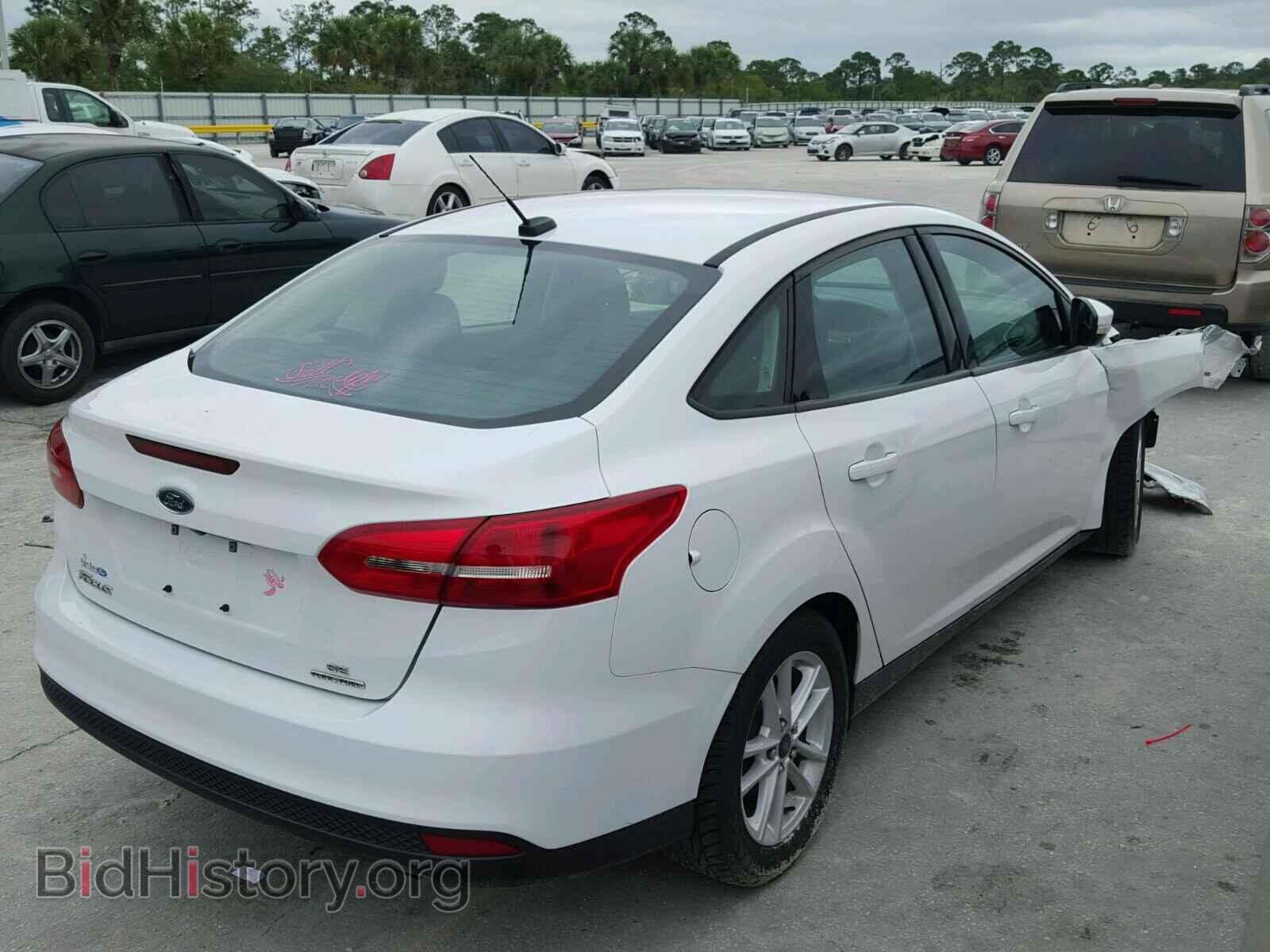 2015 FORD FOCUS - VIN: 1FADP3F24FL203574 - Photo 4