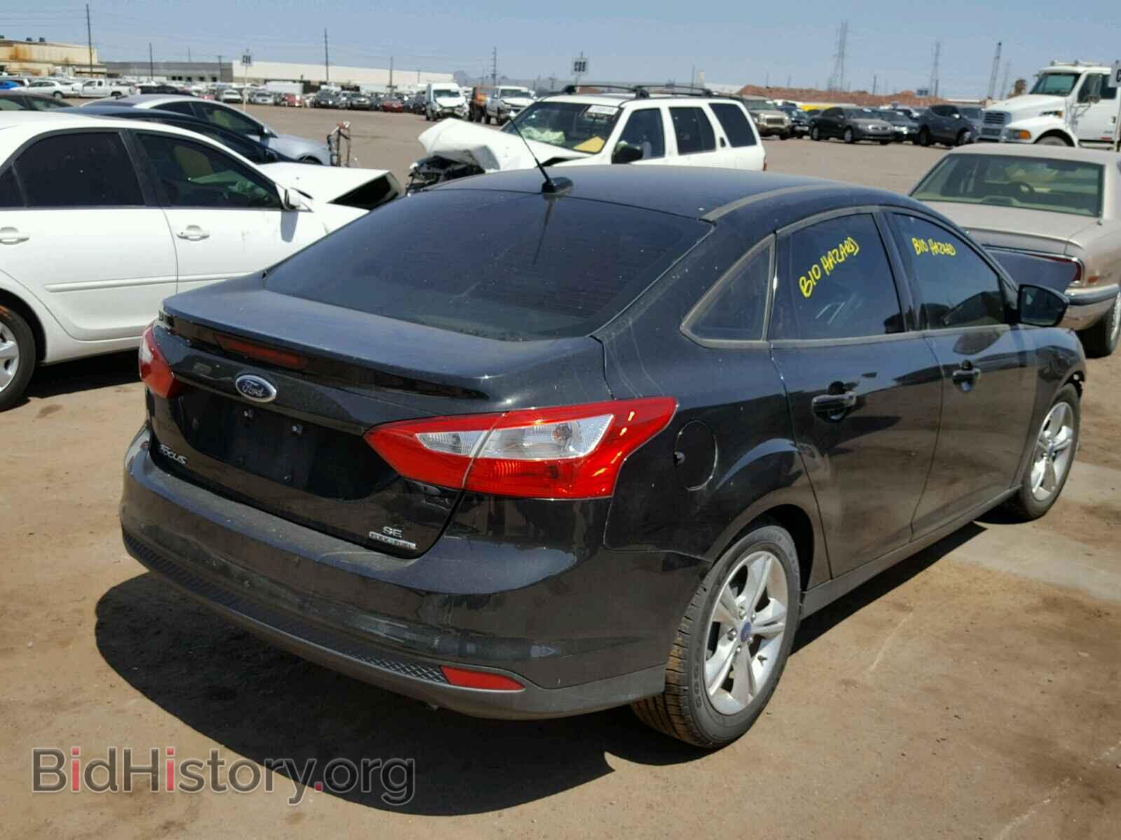 2014 FORD FOCUS - VIN: 1FADP3F20EL162388 - Photo 4