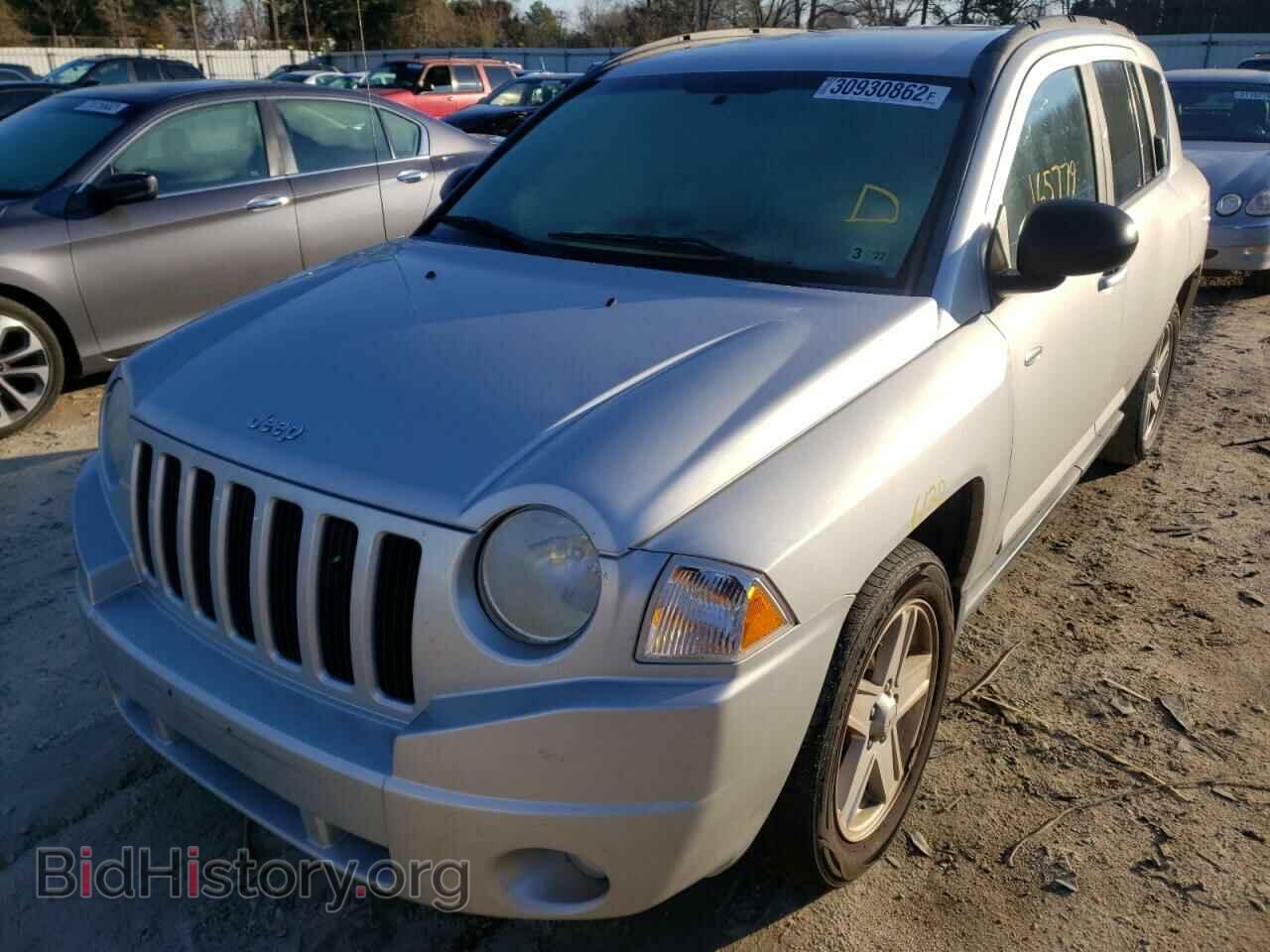 2010 JEEP COMPASS - VIN: 1J4NT1FA8AD646975 - Photo 2