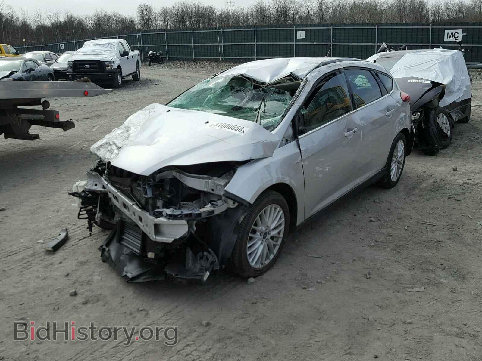 2012 Ford FOCUS (VIN 1FAHP3M21CL345879) — photo 2 of 10