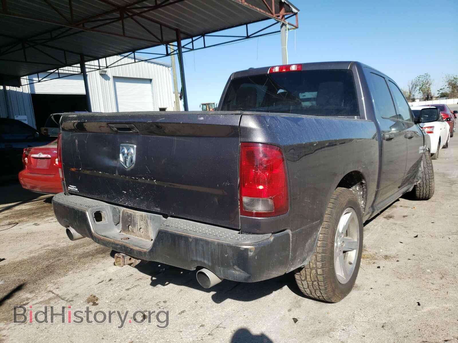 2014 RAM 1500 - VIN: 1C6RR6KT3ES441132 - Фото 4