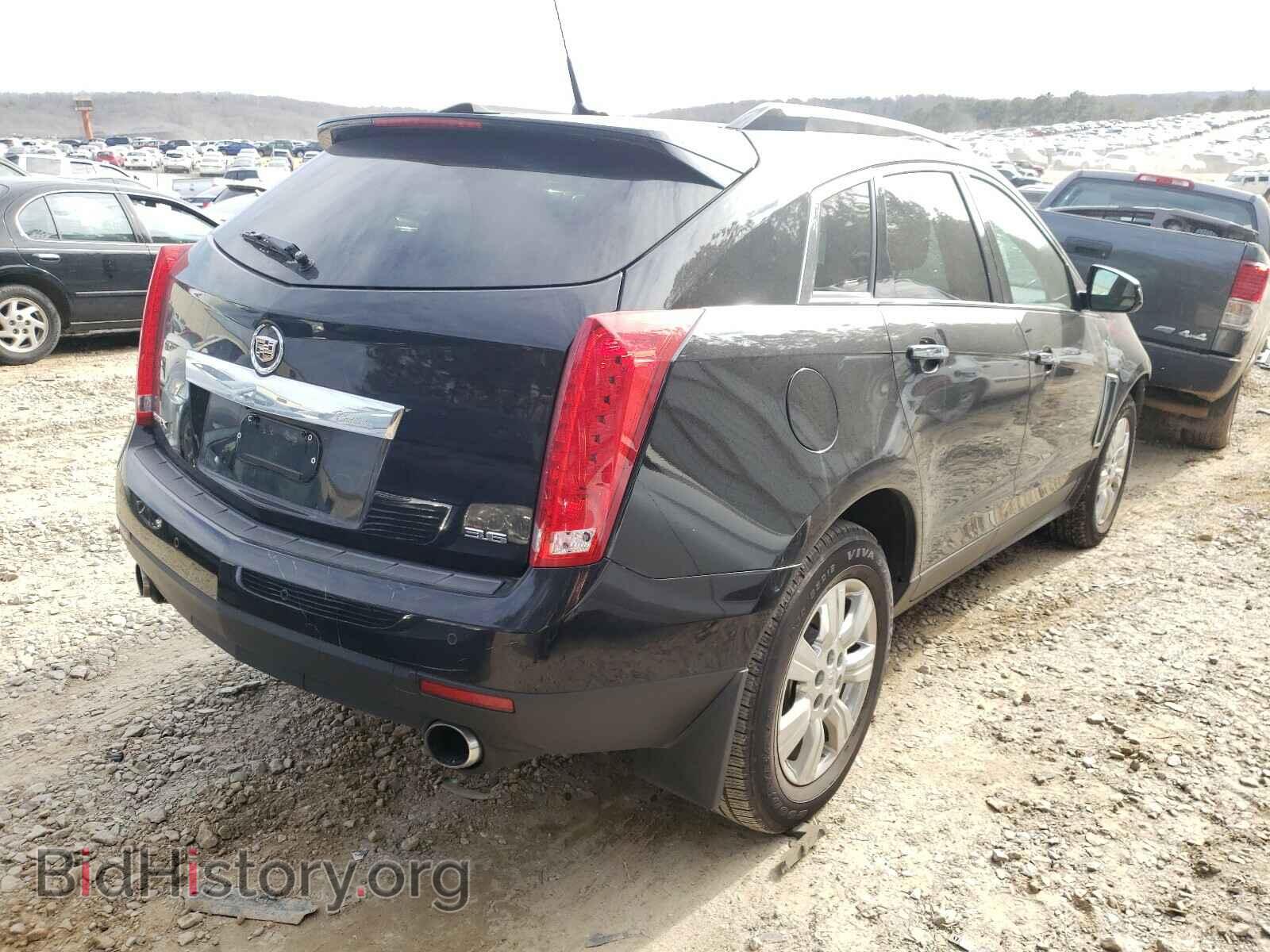 2014 CADILLAC SRX - VIN: 3GYFNBE3XES562069 - Фото 4