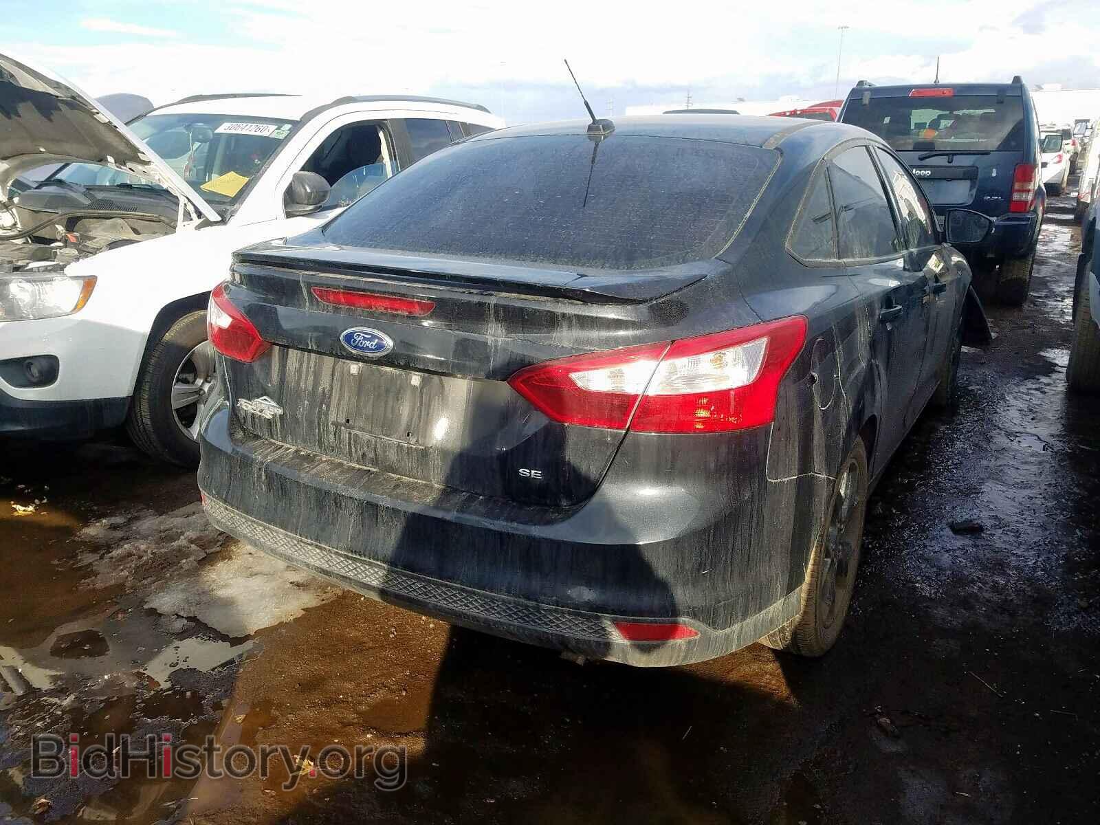 2014 FORD FOCUS - VIN: 1FADP3F24EL325916 - Photo 4