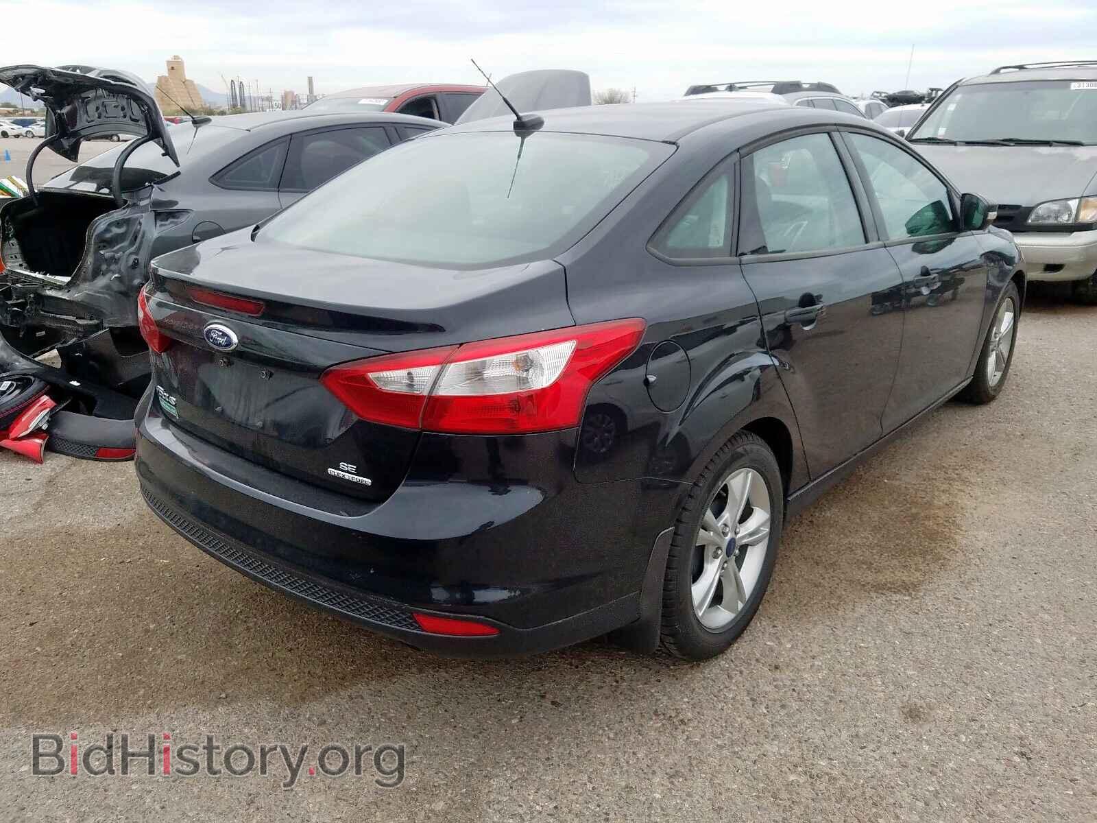2014 FORD FOCUS - VIN: 1FADP3F27EL128691 - Photo 4