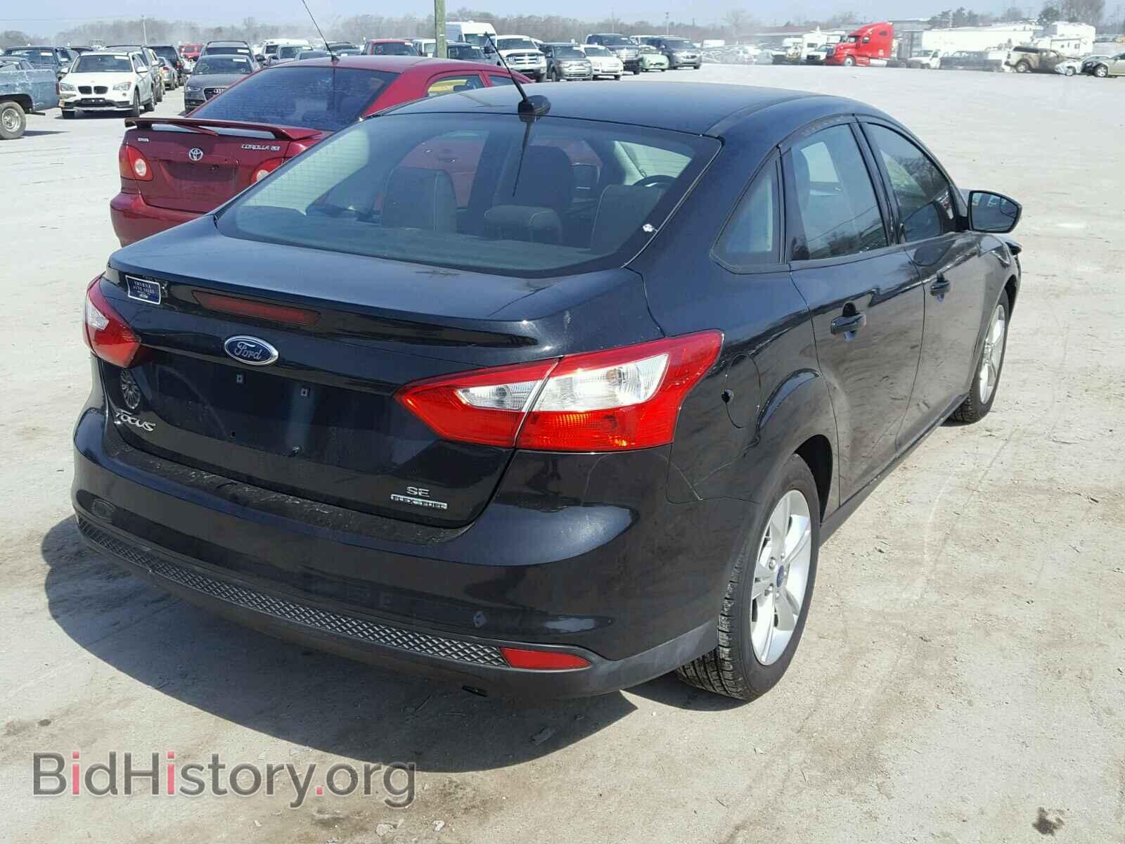 2014 FORD FOCUS - VIN: 1FADP3F2XEL273207 - Photo 4