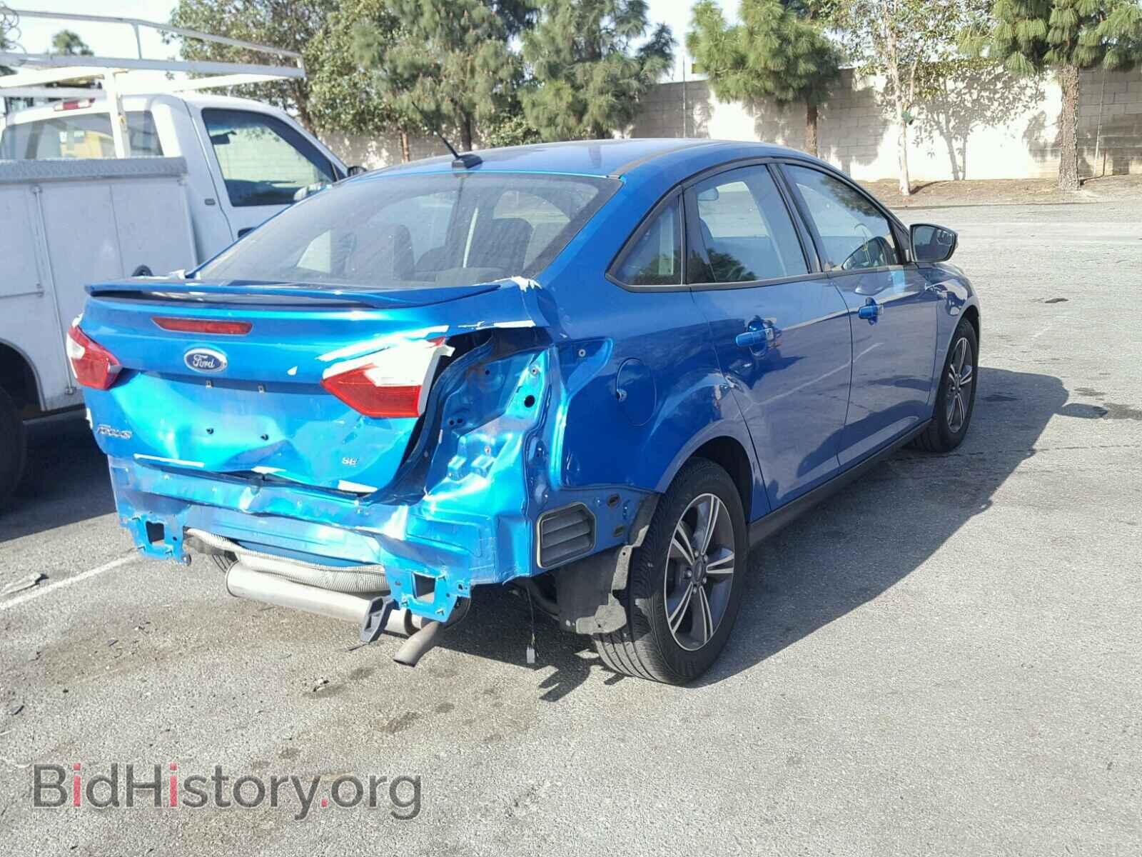2014 FORD FOCUS - VIN: 1FADP3F21EL123809 - Photo 4