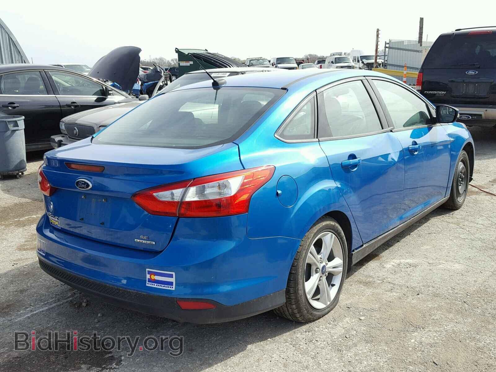 2014 FORD FOCUS - VIN: 1FADP3F23EL218663 - Photo 4