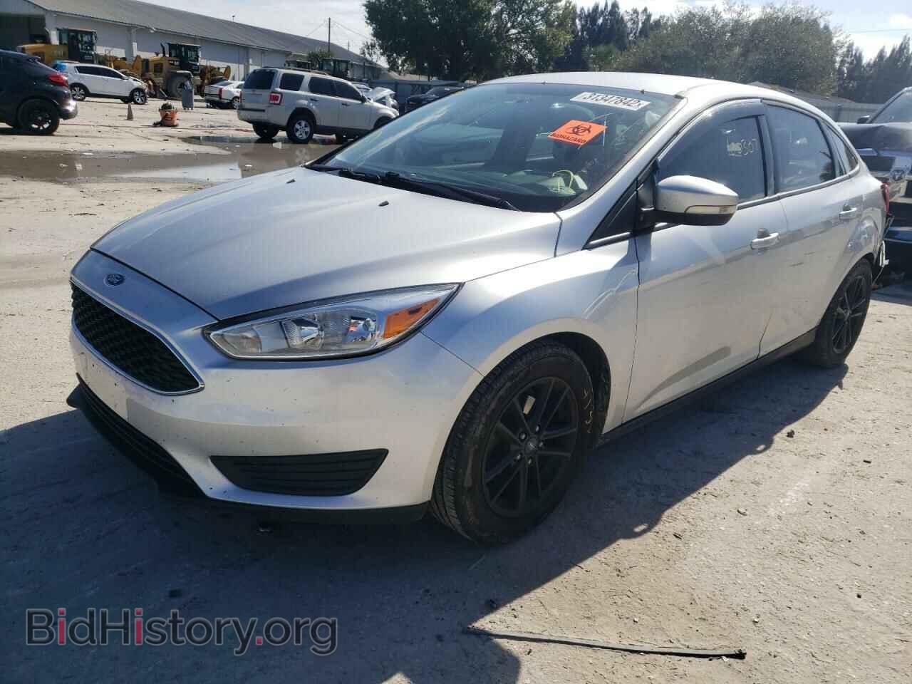 2016 FORD FOCUS - VIN: 1FADP3F21GL297771 - Фото 2