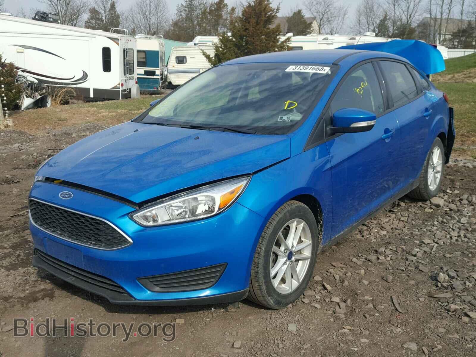 2016 FORD FOCUS - VIN: 1FADP3F22GL385129 - Photo 2