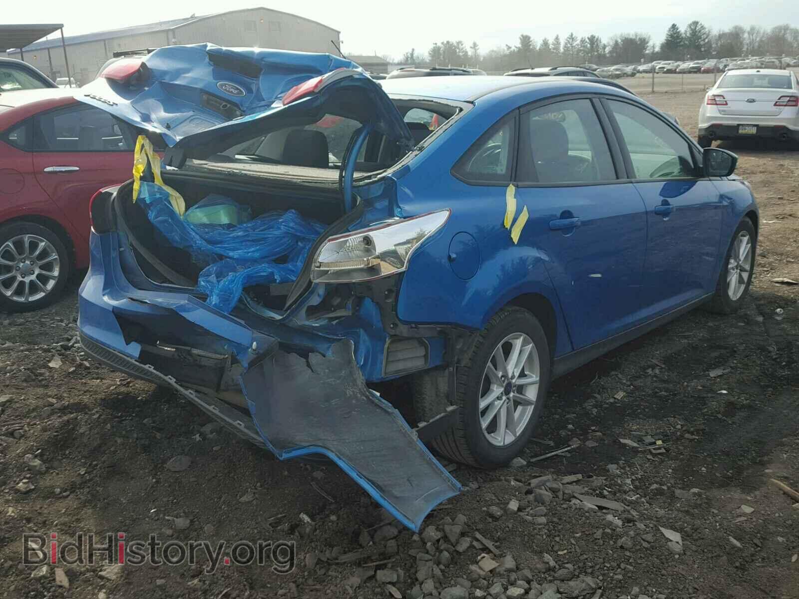 2016 FORD FOCUS - VIN: 1FADP3F22GL385129 - Photo 4