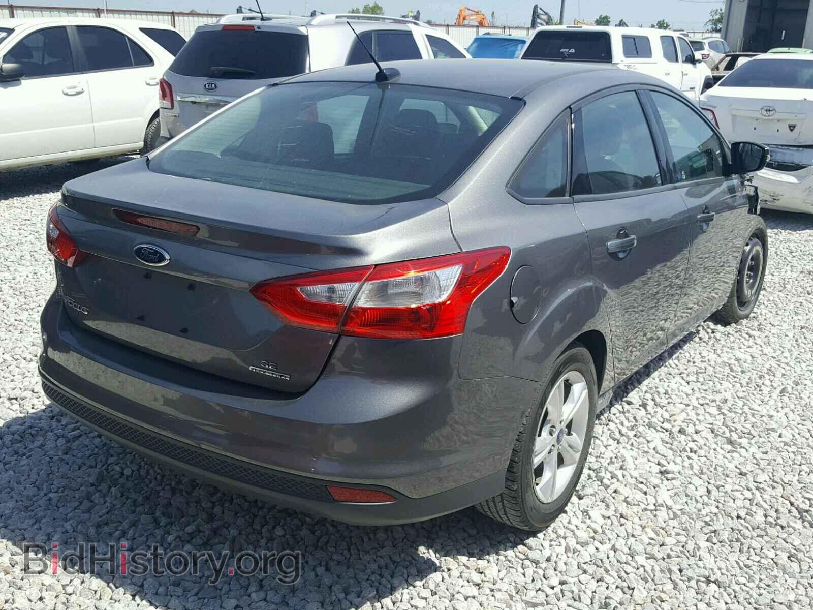 2014 FORD FOCUS - VIN: 1FADP3F21EL218600 - Photo 4