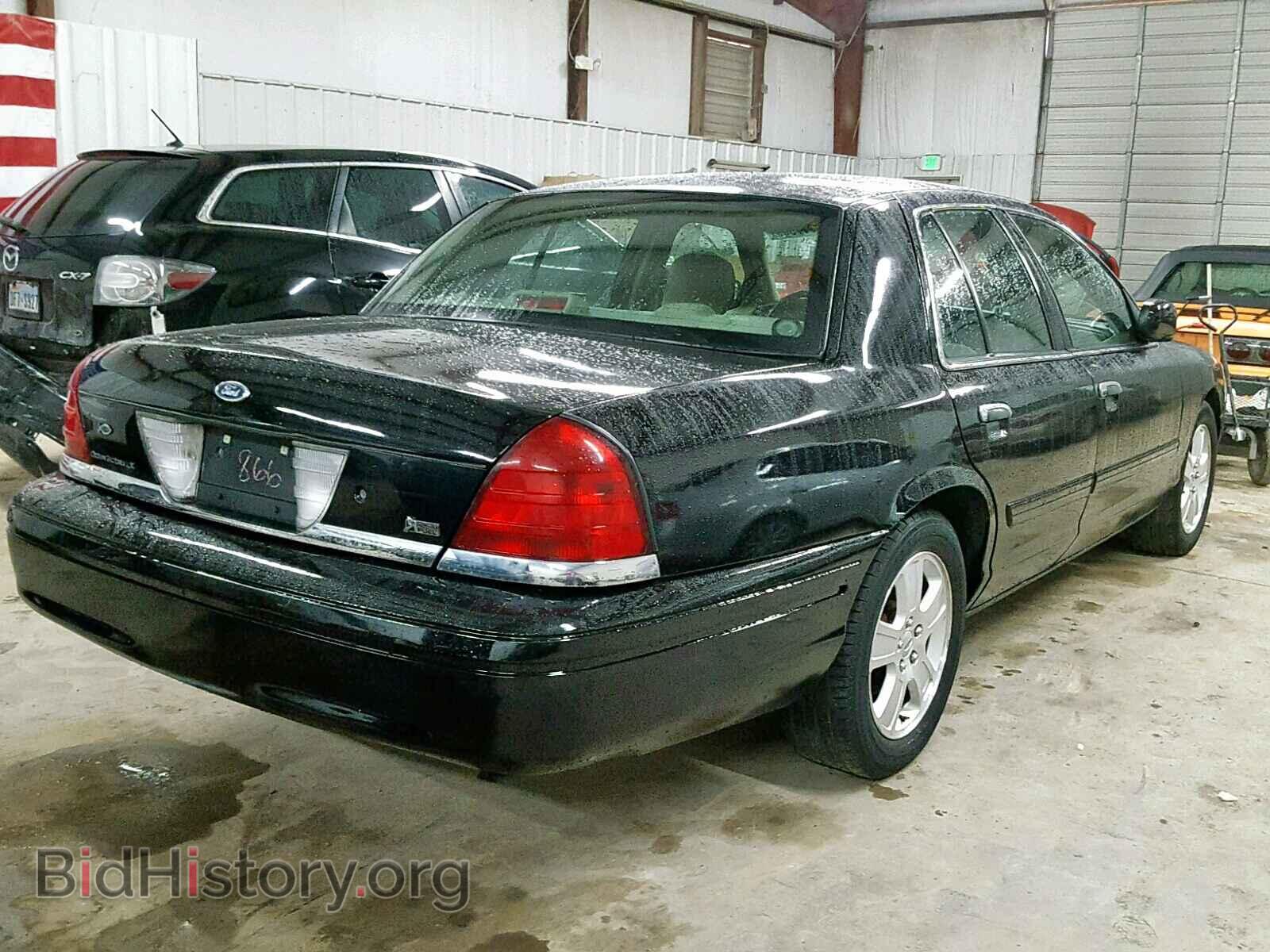 2011 FORD CROWN VIC - VIN: 2FABP7EV4BX145103 - Фото 4