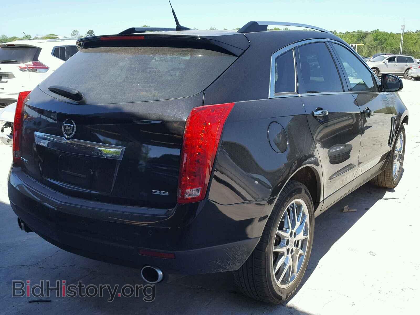 2014 CADILLAC SRX PERFOR - VIN: 3GYFNCE38ES562299 - Фото 4