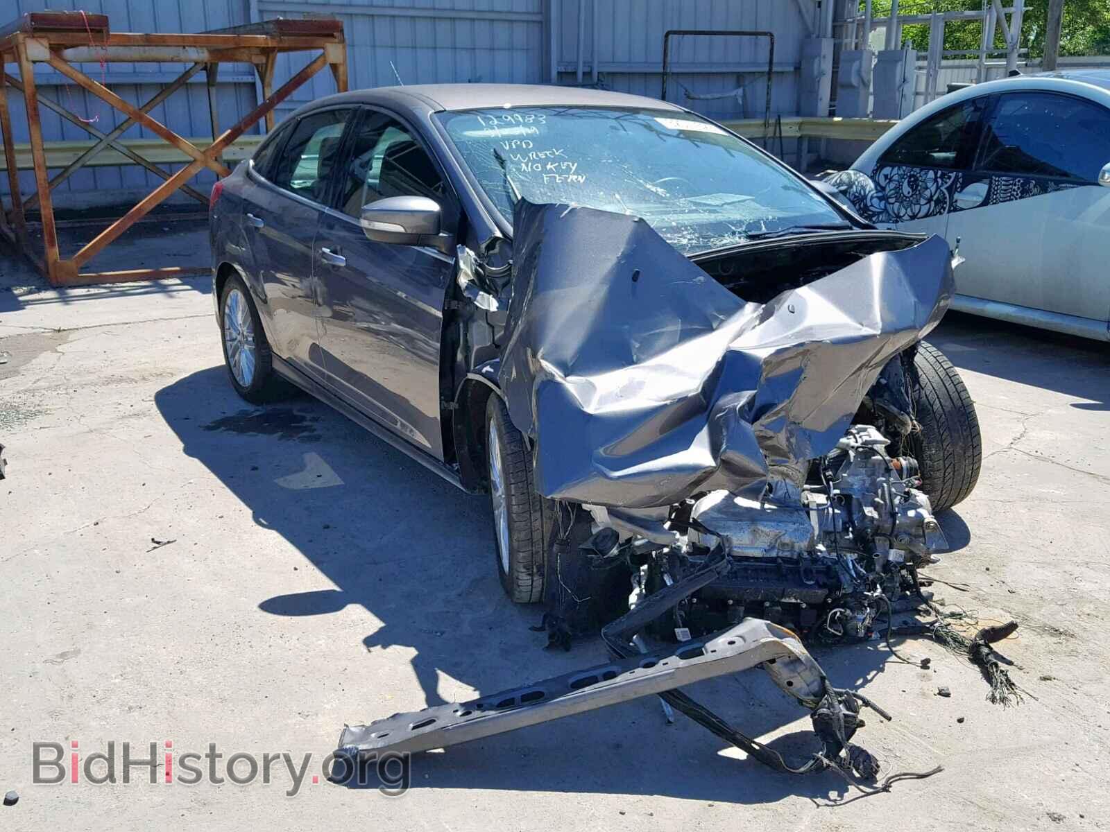 Фотография 1FADP3J27EL149144 - FORD FOCUS 2014