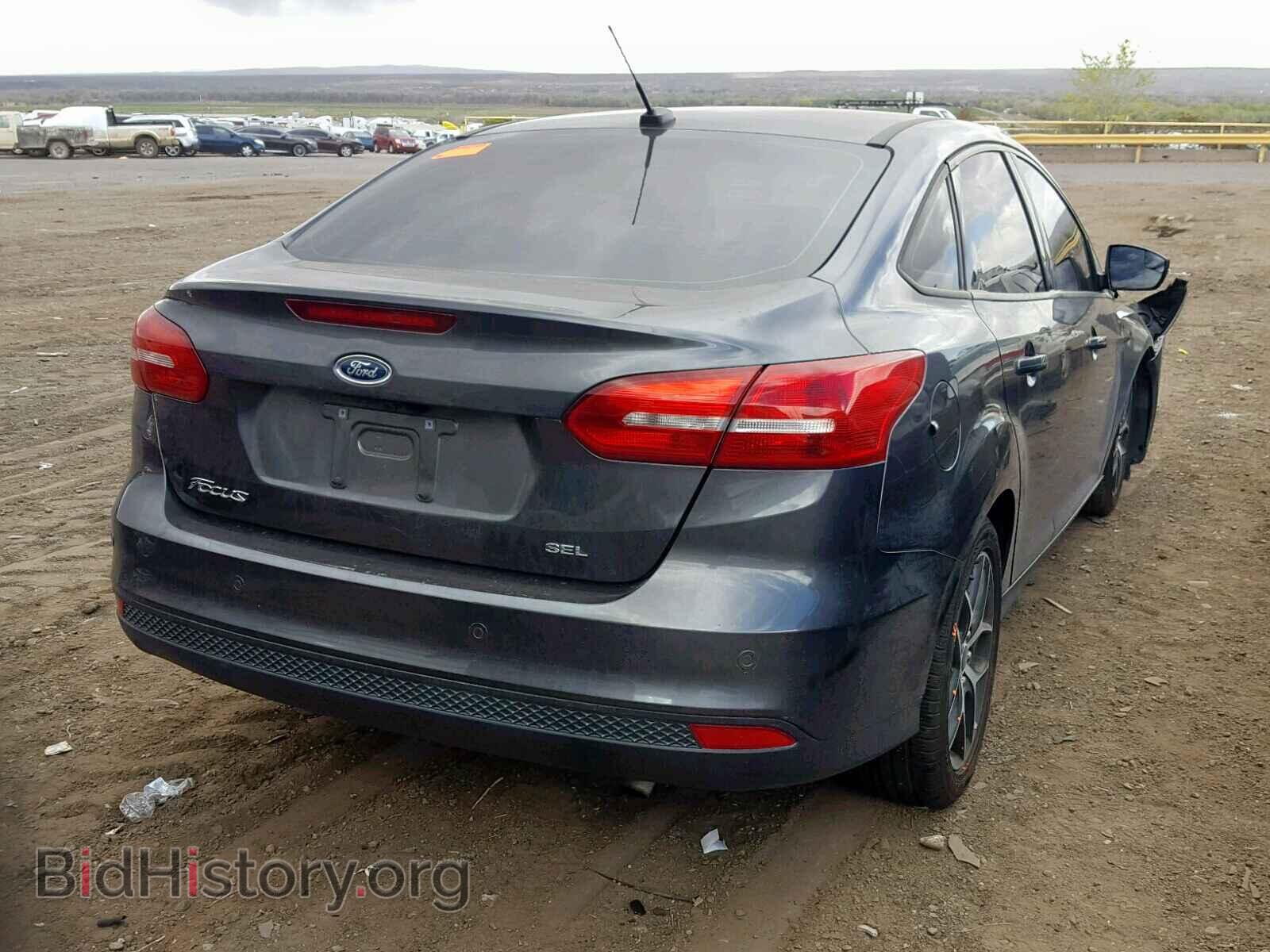 2017 FORD FOCUS - VIN: 1FADP3H23HL205574 - Photo 4
