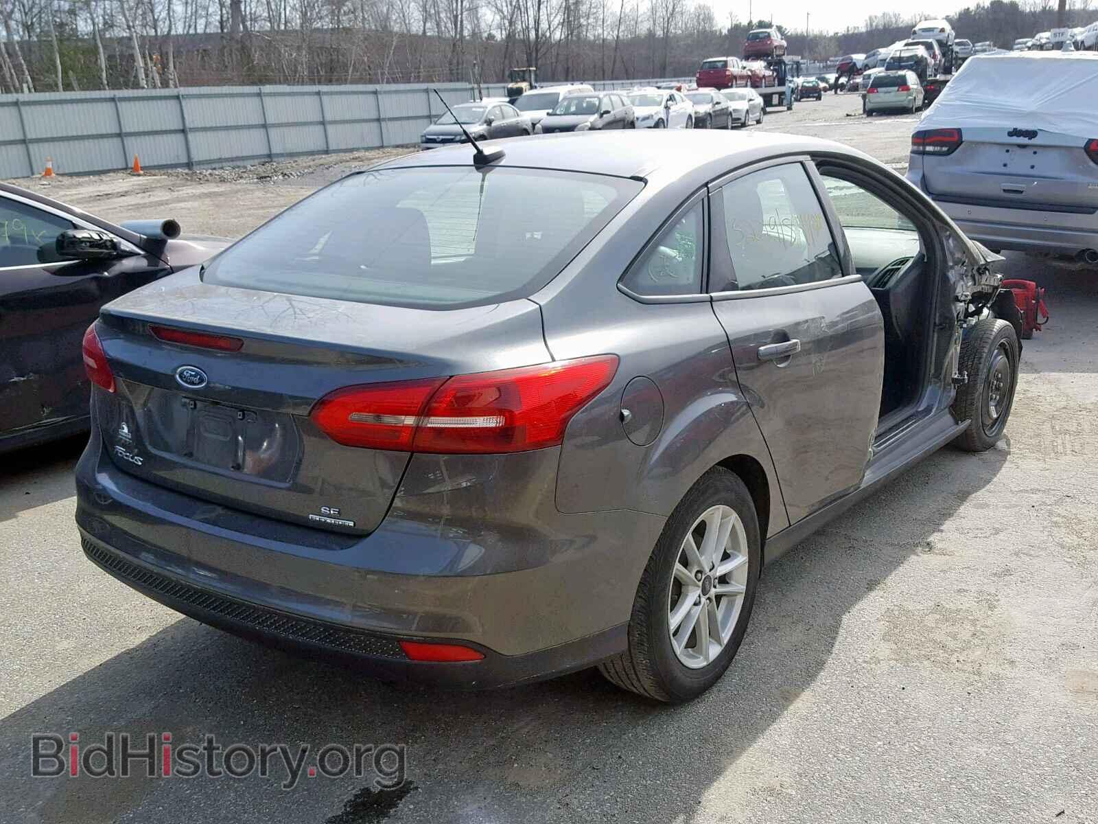2016 FORD FOCUS SE - VIN: 1FADP3F2XGL370894 - Фото 4