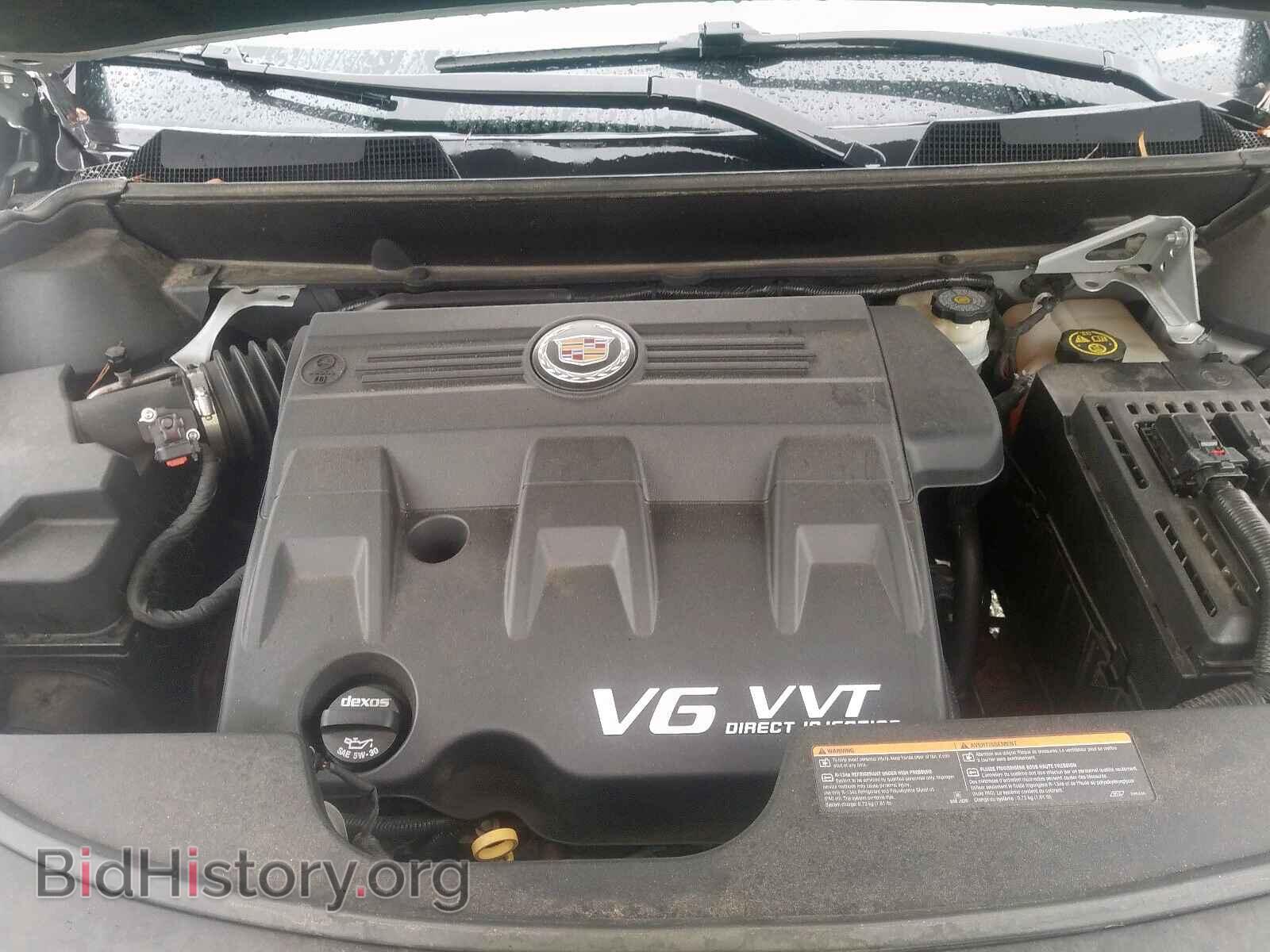 2014 CADILLAC SRX PERFOR - VIN: 3GYFNCE36ES613380 - Фото 7