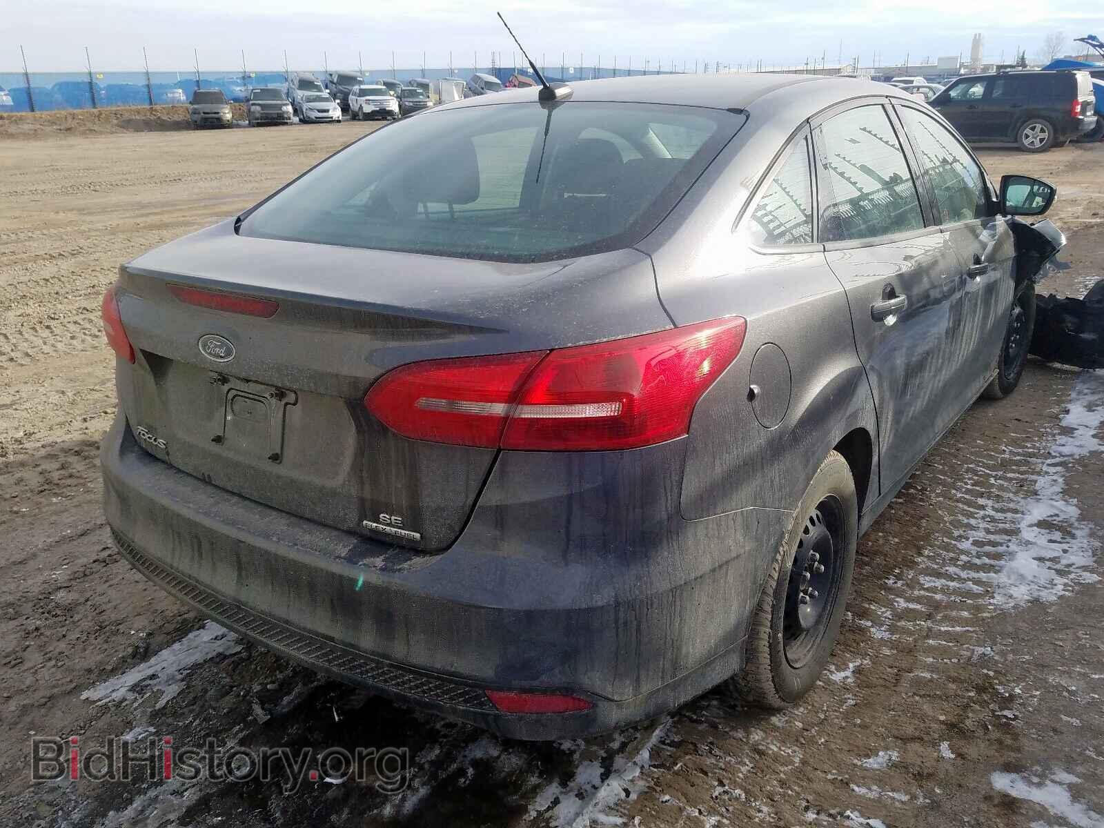 2015 FORD FOCUS - VIN: 1FADP3F27FL352092 - Photo 4