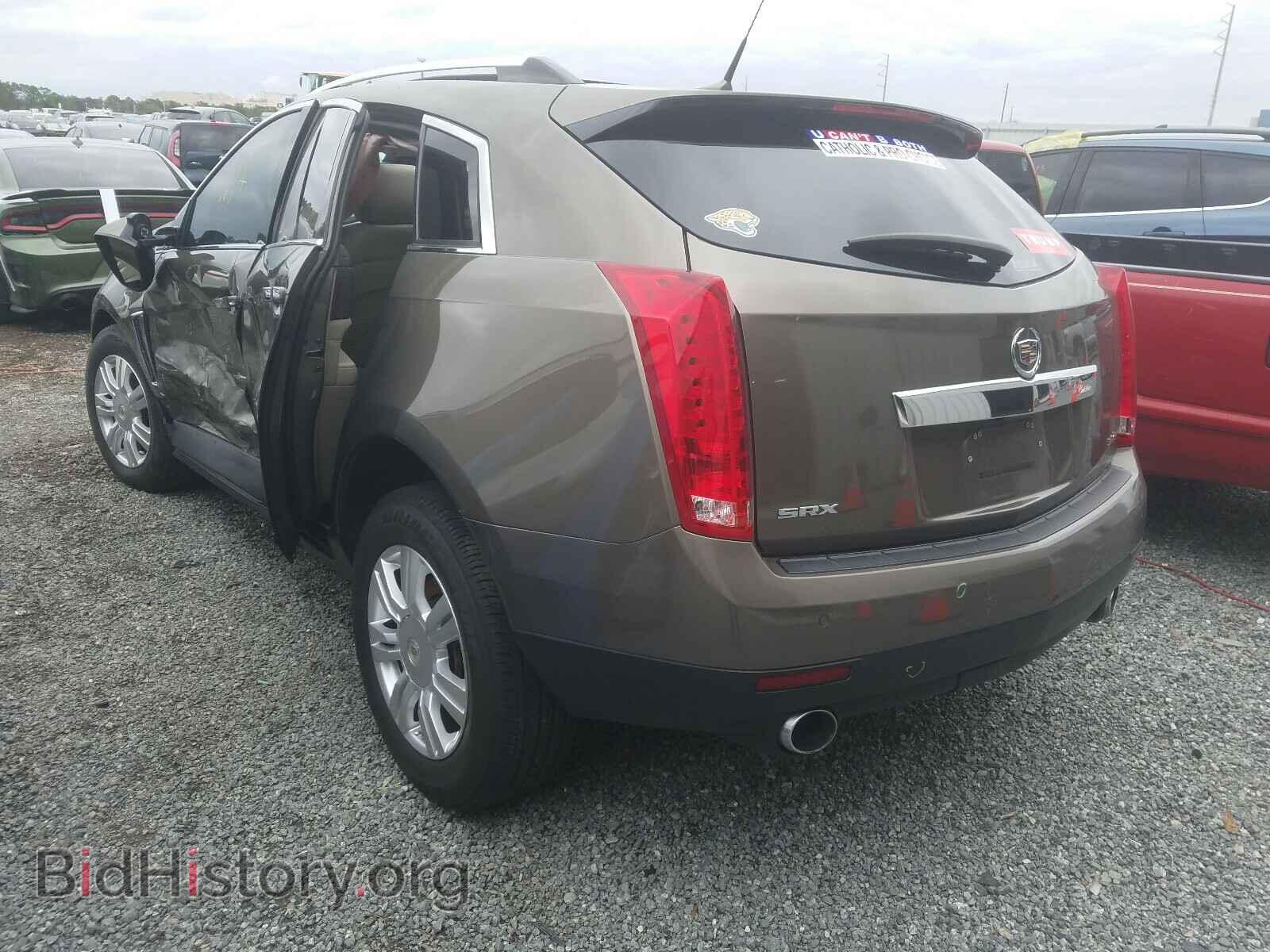2014 CADILLAC SRX - VIN: 3GYFNBE31ES588169 - Фото 3