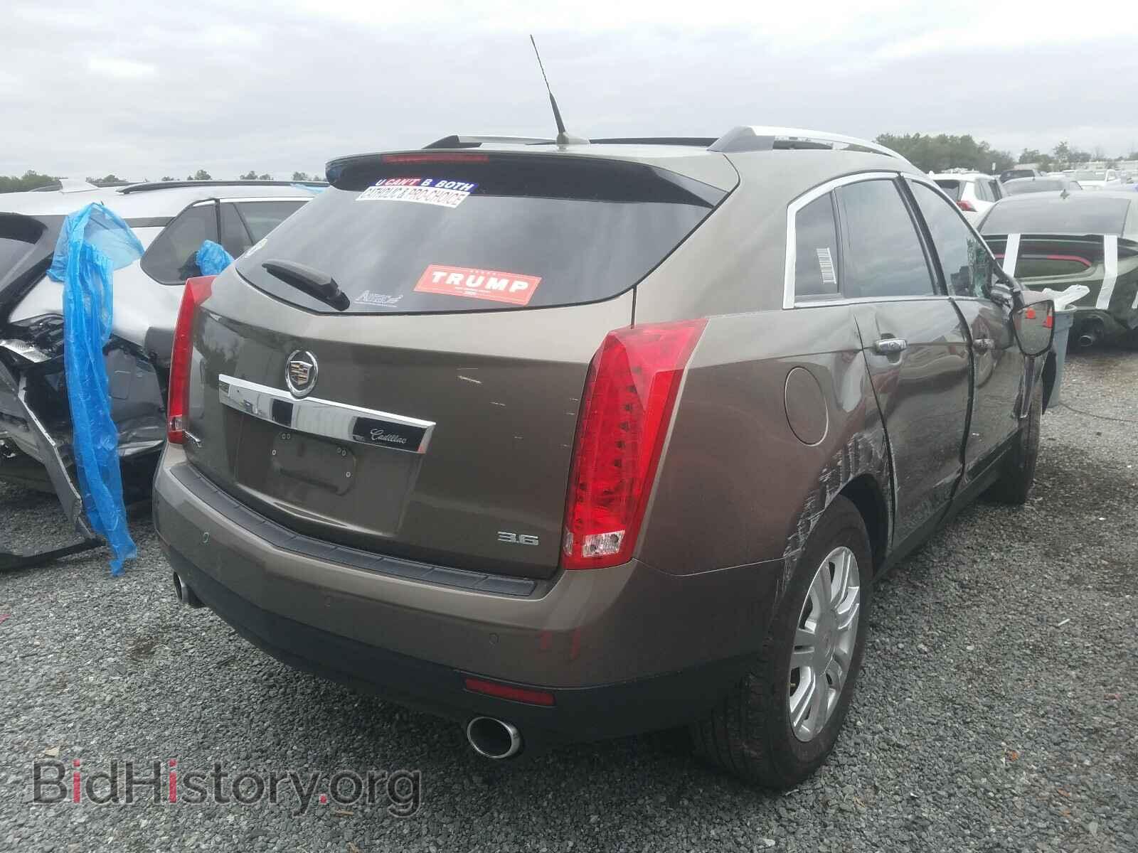 2014 CADILLAC SRX - VIN: 3GYFNBE31ES588169 - Фото 4