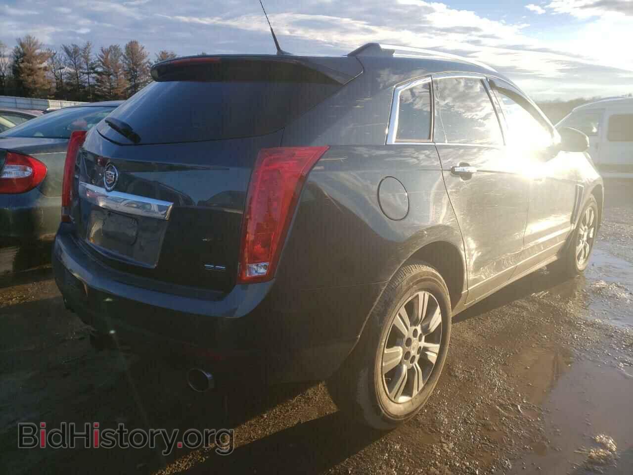 2014 CADILLAC SRX - VIN: 3GYFNEE30ES570439 - Фото 4