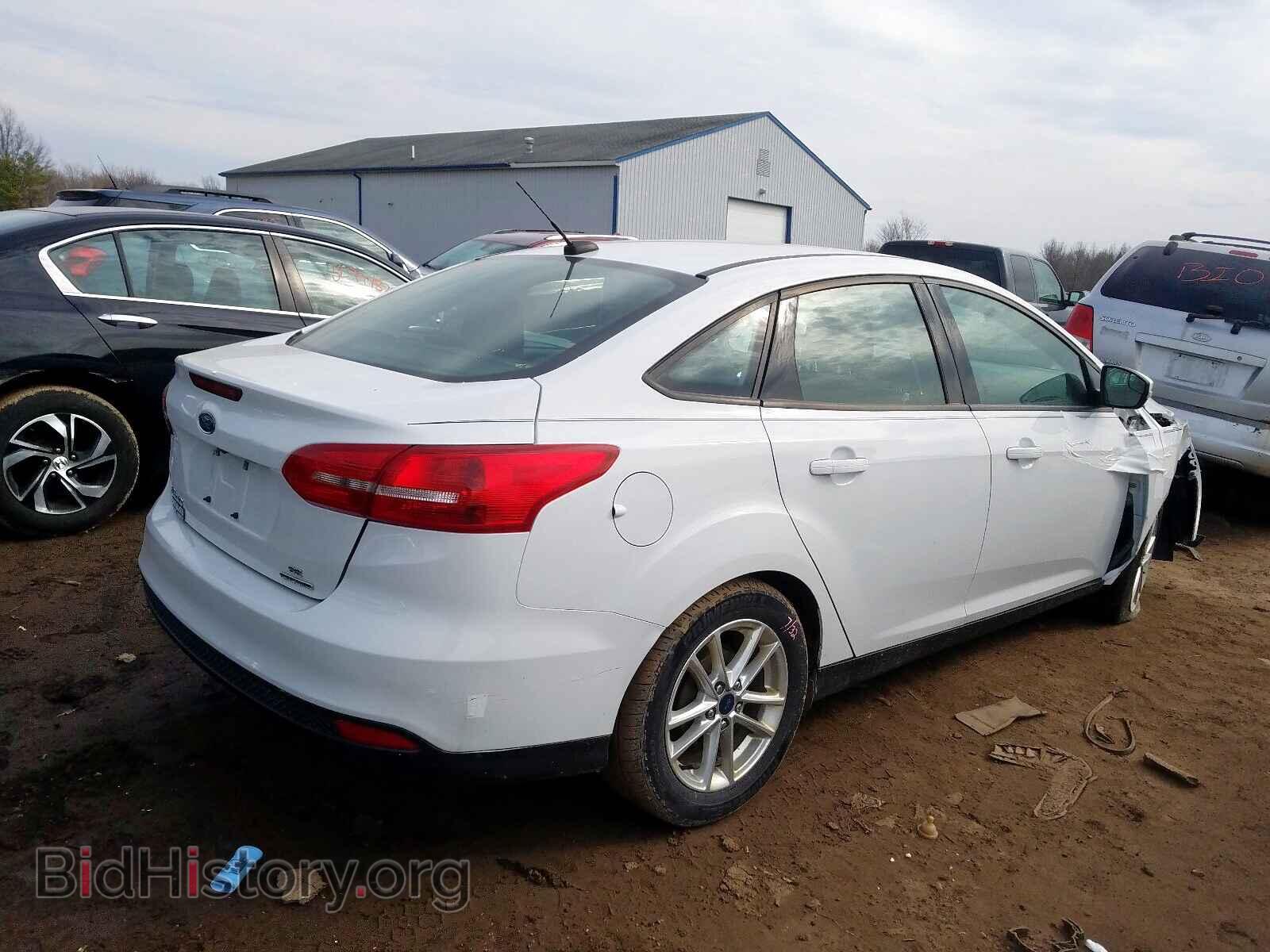 2016 FORD FOCUS - VIN: 1FADP3F22GL350851 - Photo 4