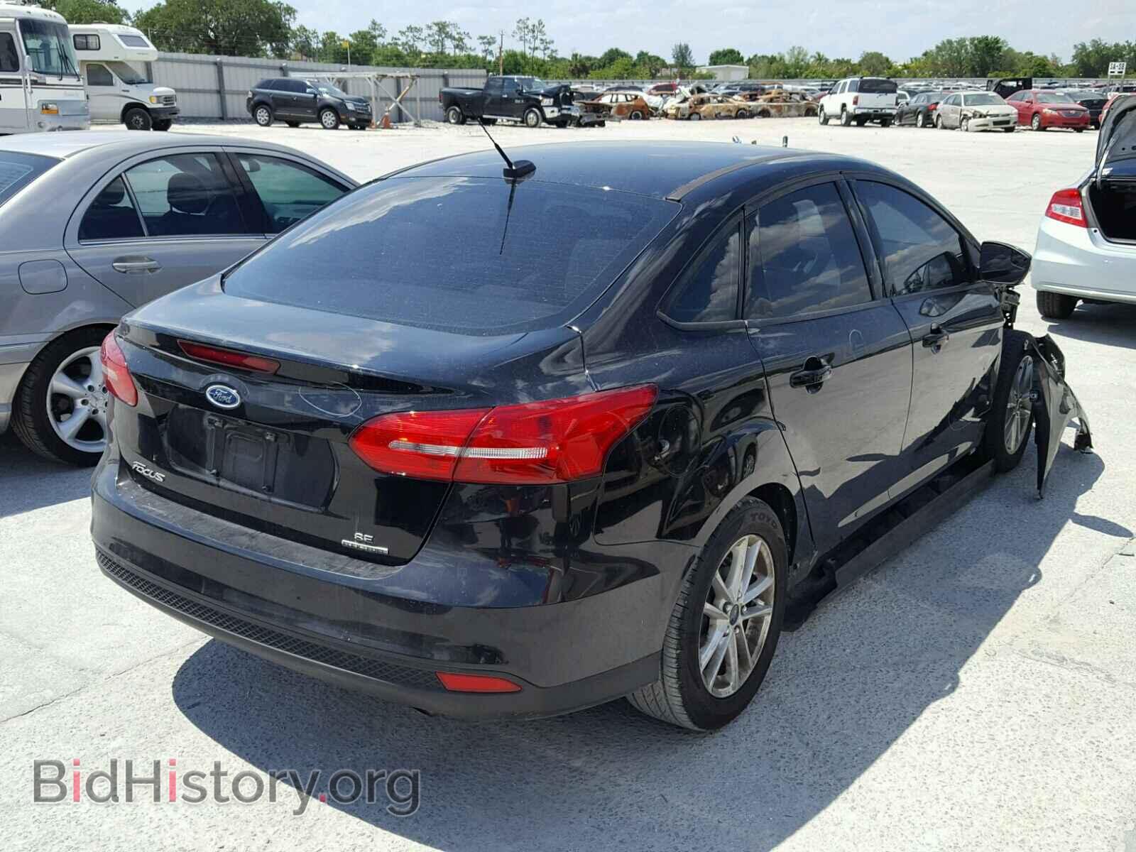 2016 FORD FOCUS - VIN: 1FADP3F26GL204002 - Photo 4