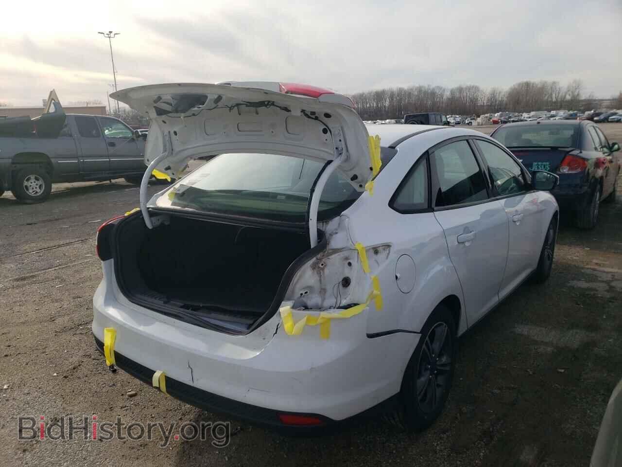 2014 FORD FOCUS - VIN: 1FADP3F25EL141892 - Photo 4