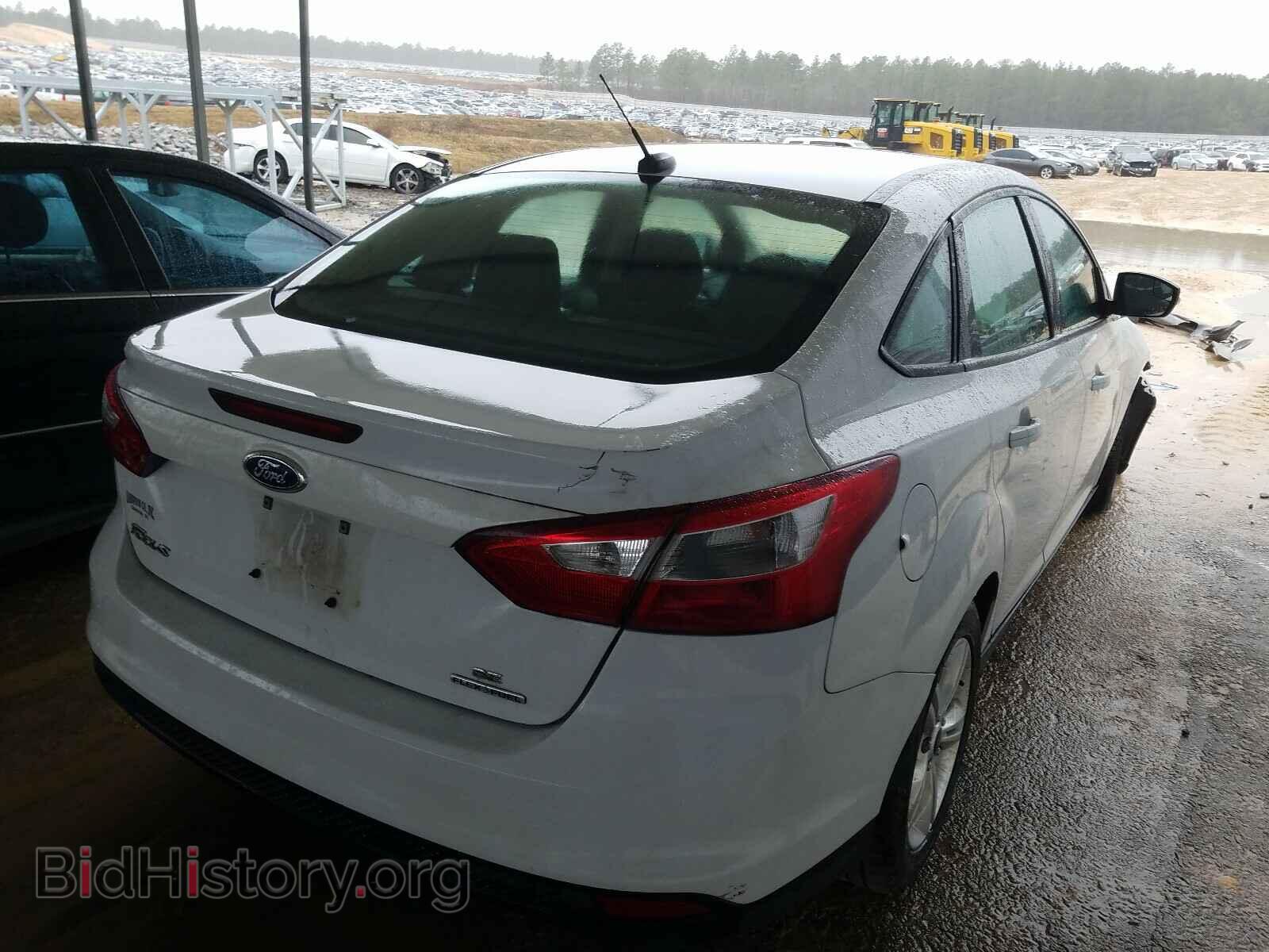 2014 FORD FOCUS - VIN: 1FADP3F25EL318070 - Photo 4