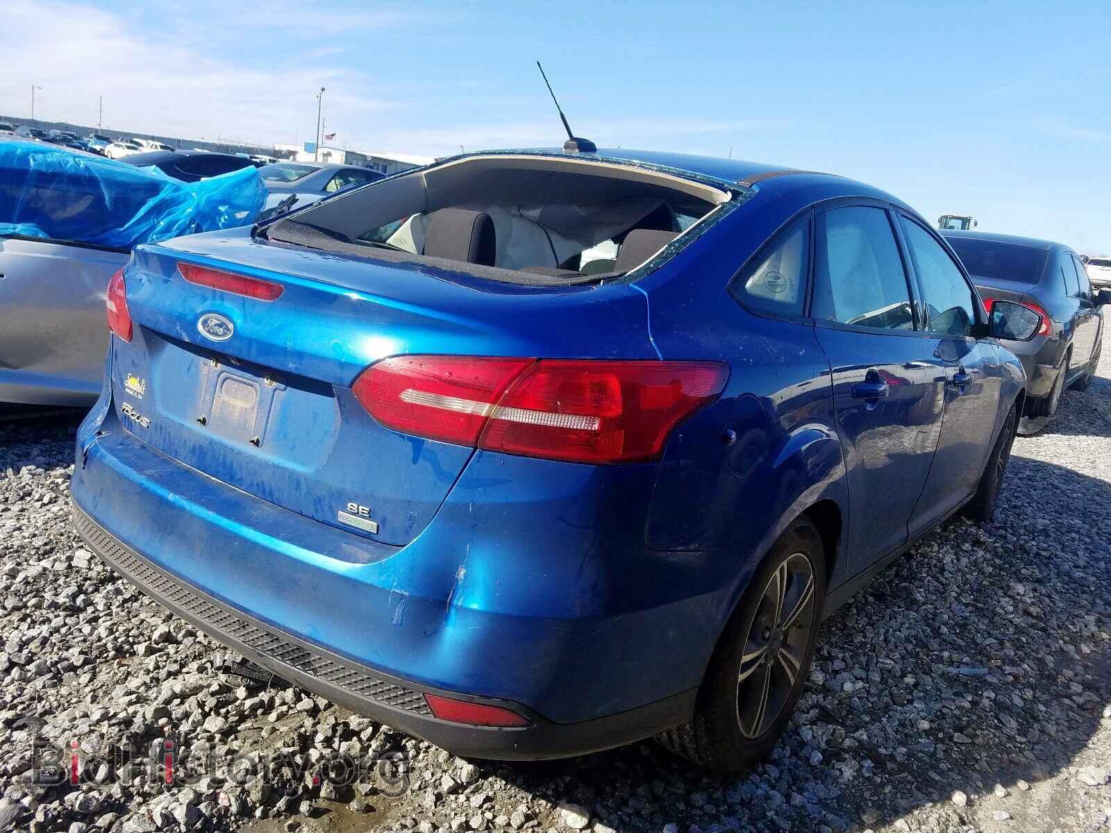 2018 FORD FOCUS - VIN: 1FADP3FE1JL208749 - Фото 4