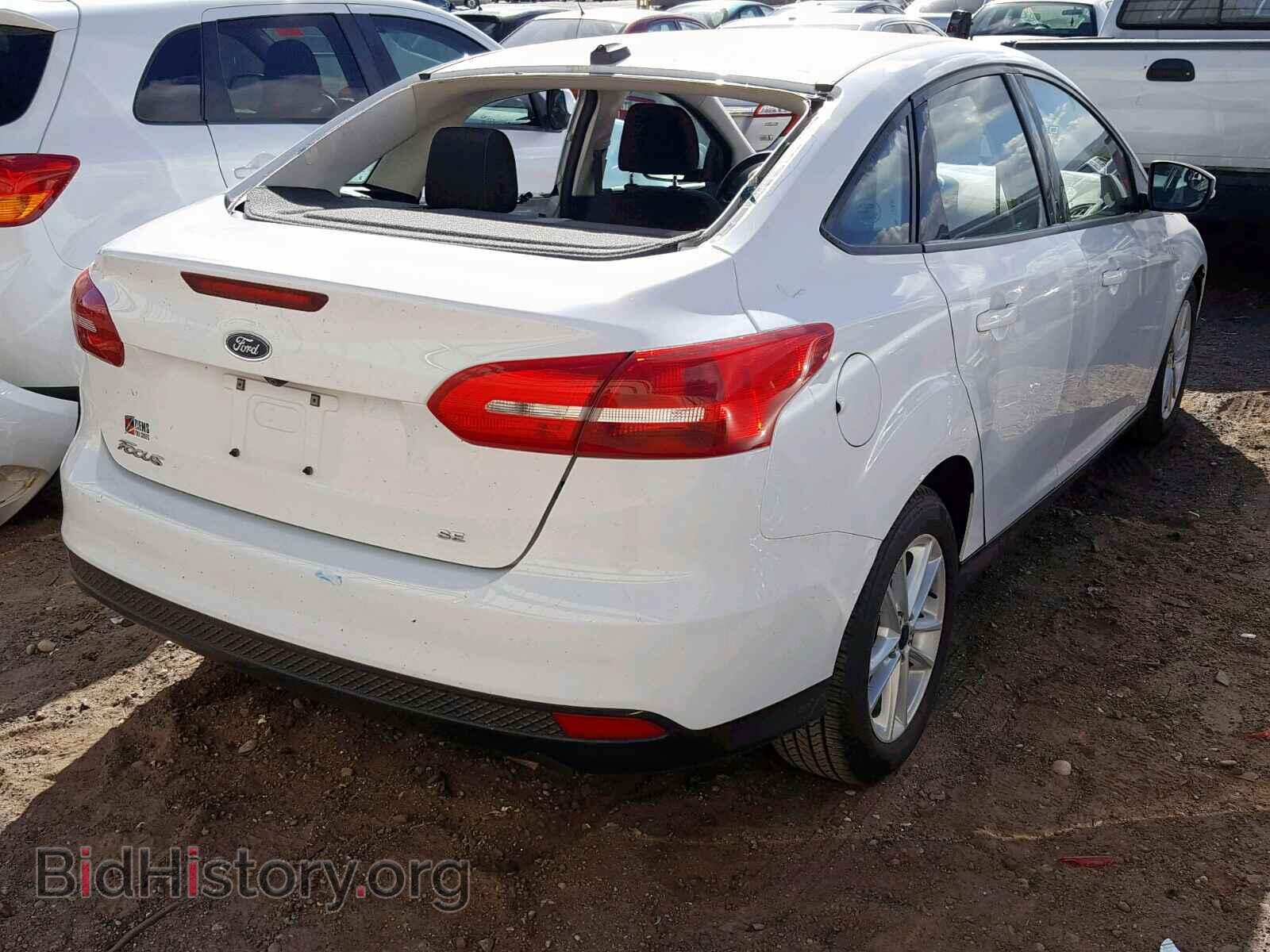 2017 FORD FOCUS SE - VIN: 1FADP3F2XHL217661 - Фото 4