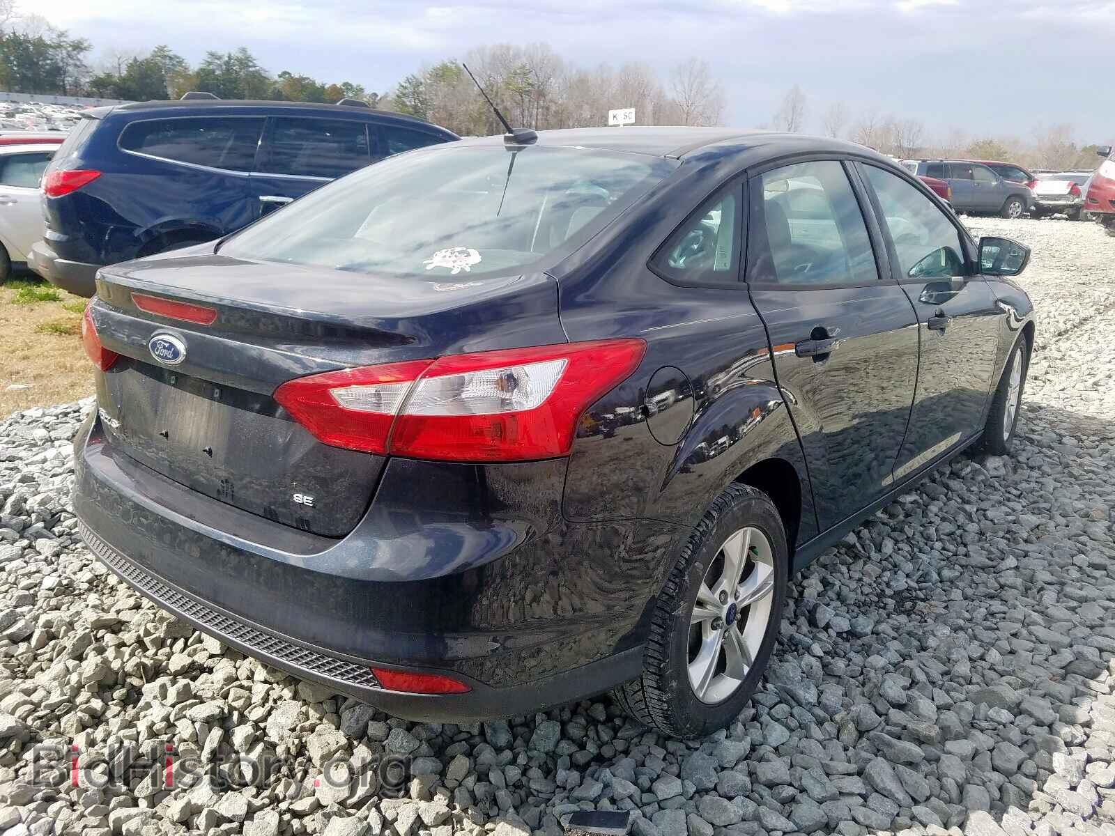 2013 FORD FOCUS - VIN: 1FADP3F29DL142588 - Photo 4