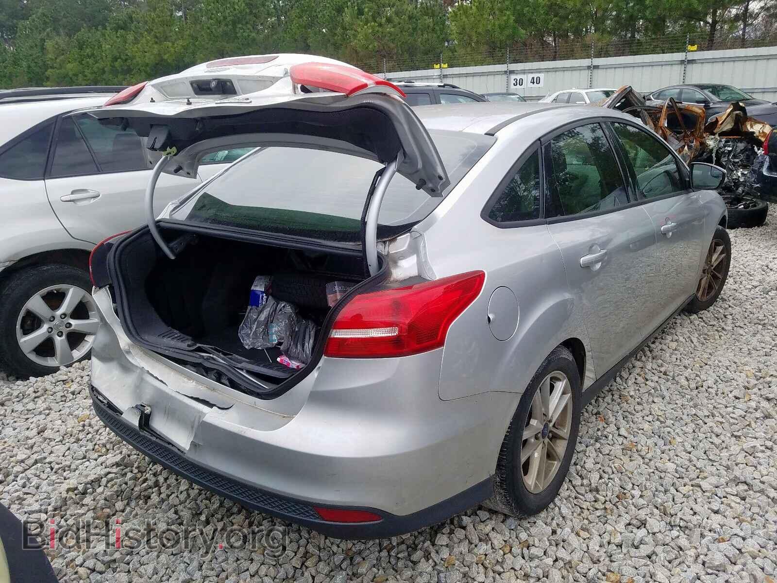 2015 FORD FOCUS - VIN: 1FADP3F21FL238704 - Photo 4