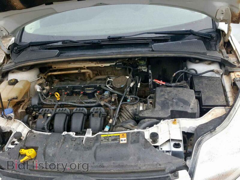 2014 Ford FOCUS (VIN 1FADP3F2XEL243799) — photo 7 of 9