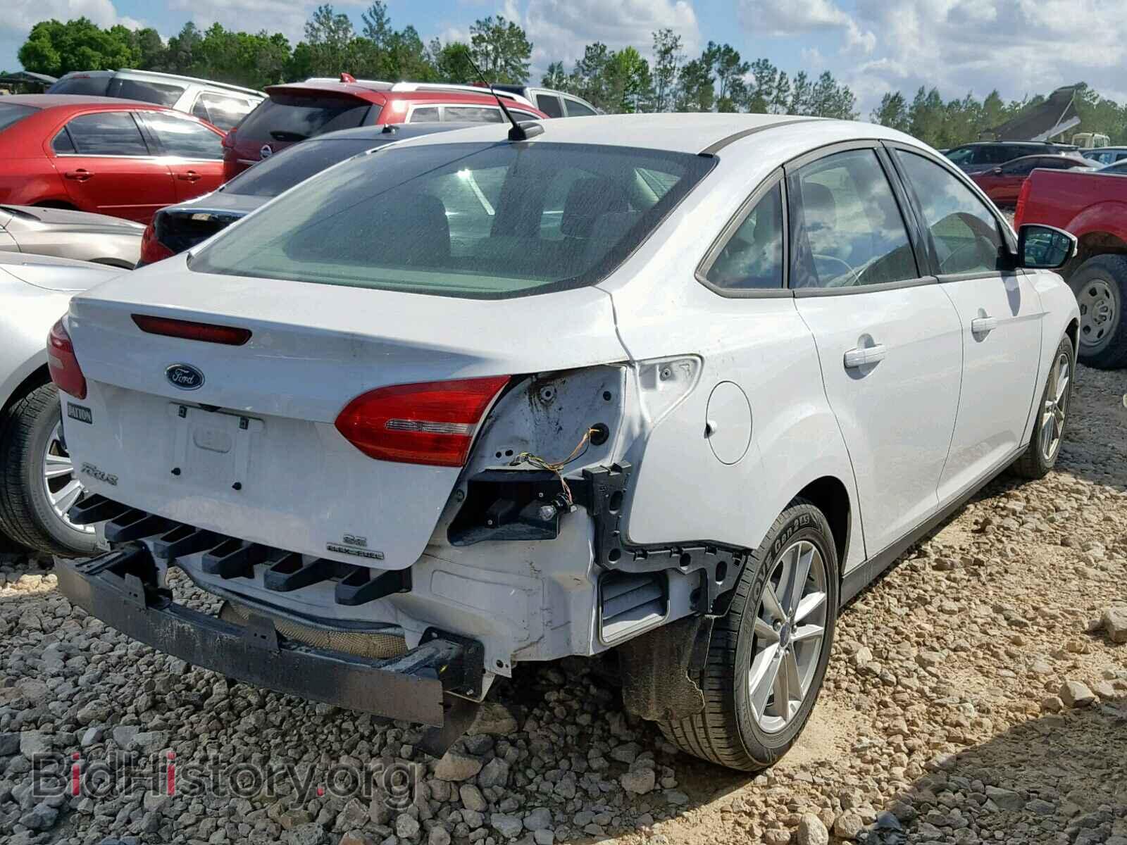 2016 FORD FOCUS SE - VIN: 1FADP3F2XGL264803 - Фото 4