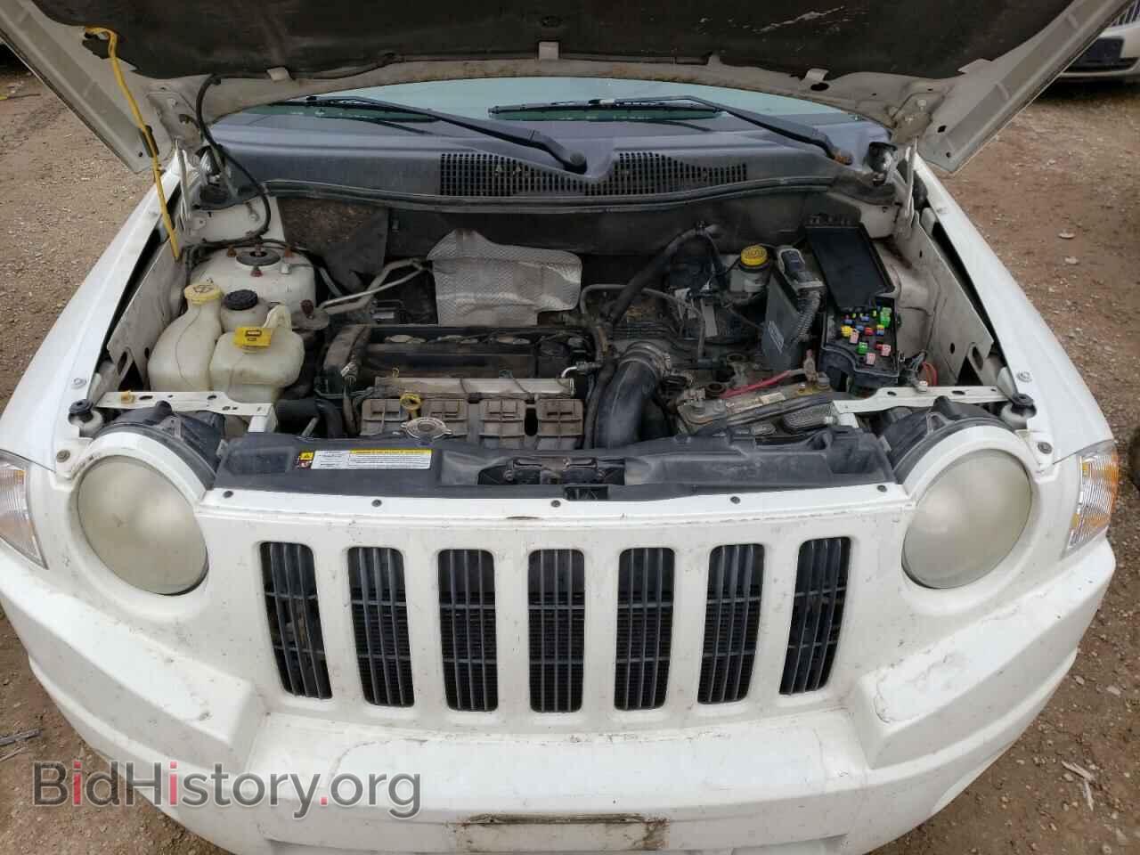 2010 JEEP COMPASS - VIN: 1J4NT4FB3AD558085 - Photo 7