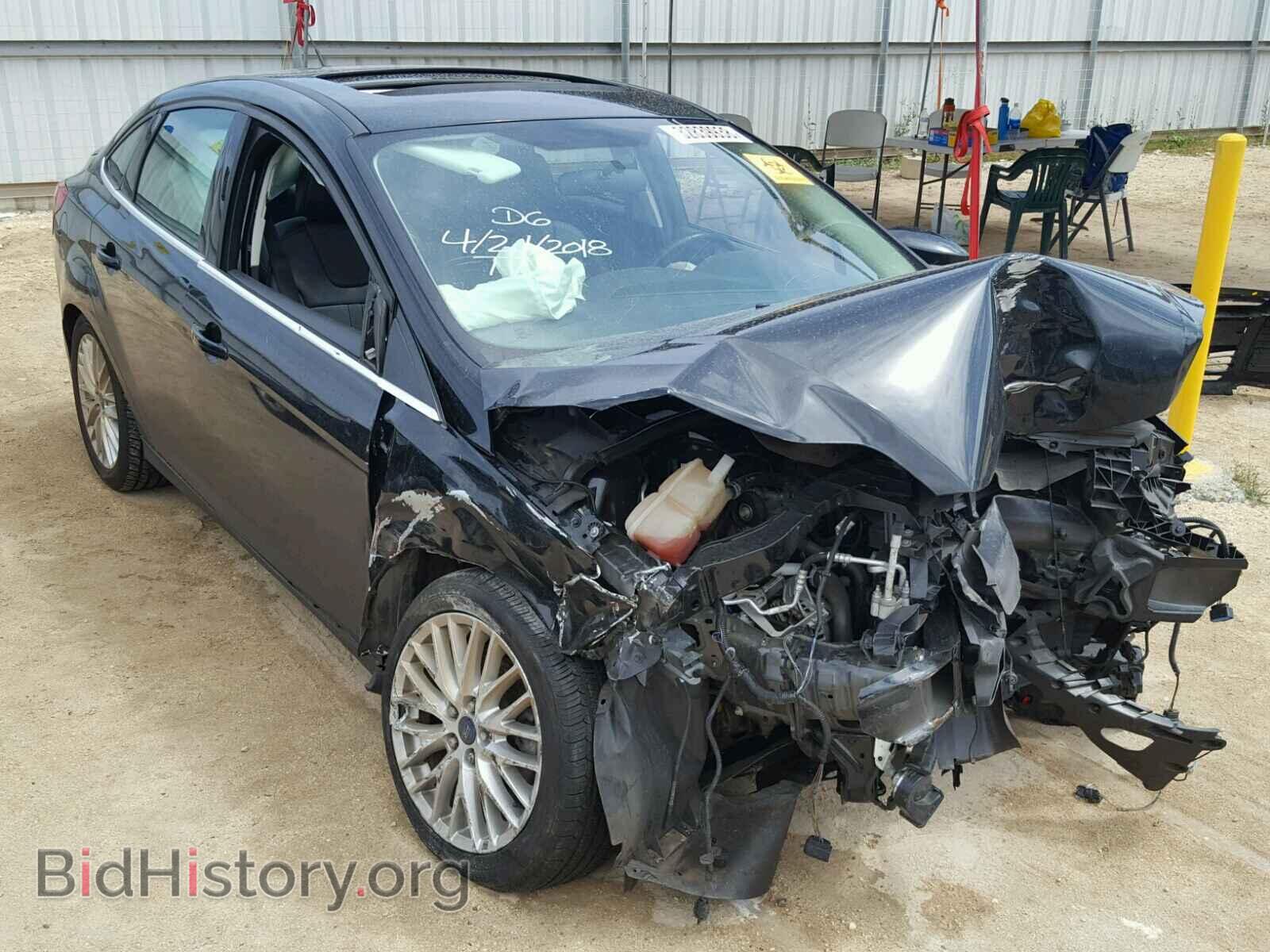 Фотография 1FADP3J23EL338924 - FORD FOCUS 2014