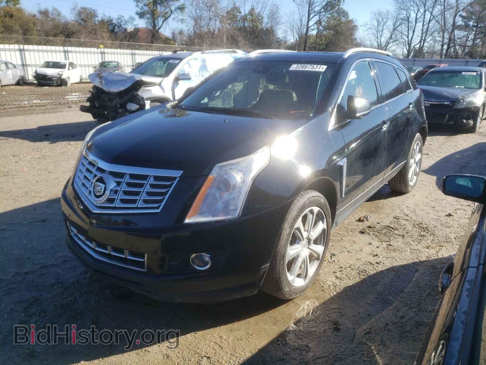 2013 CADILLAC SRX - VIN: 3GYFNDE31DS638644 - Фото 2
