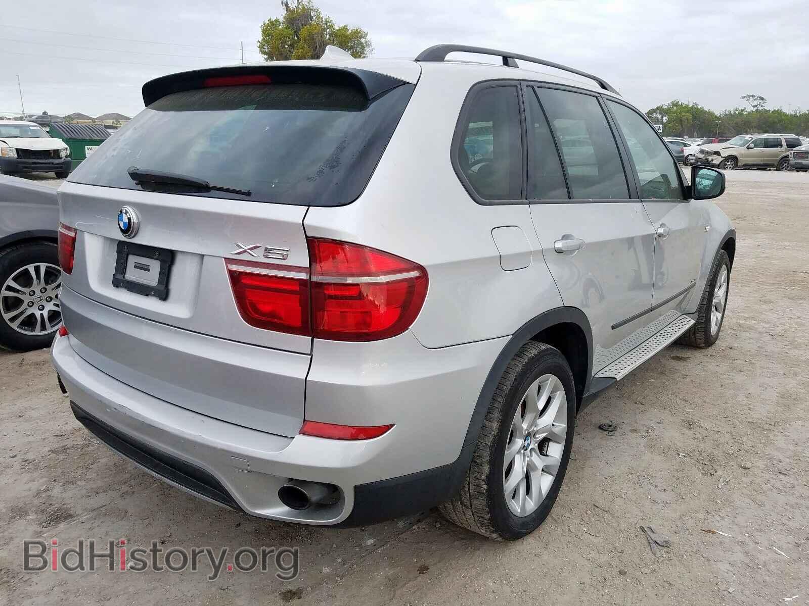 2011 BMW X5 - VIN: 5UXZV4C51BL738221 - Фото 4