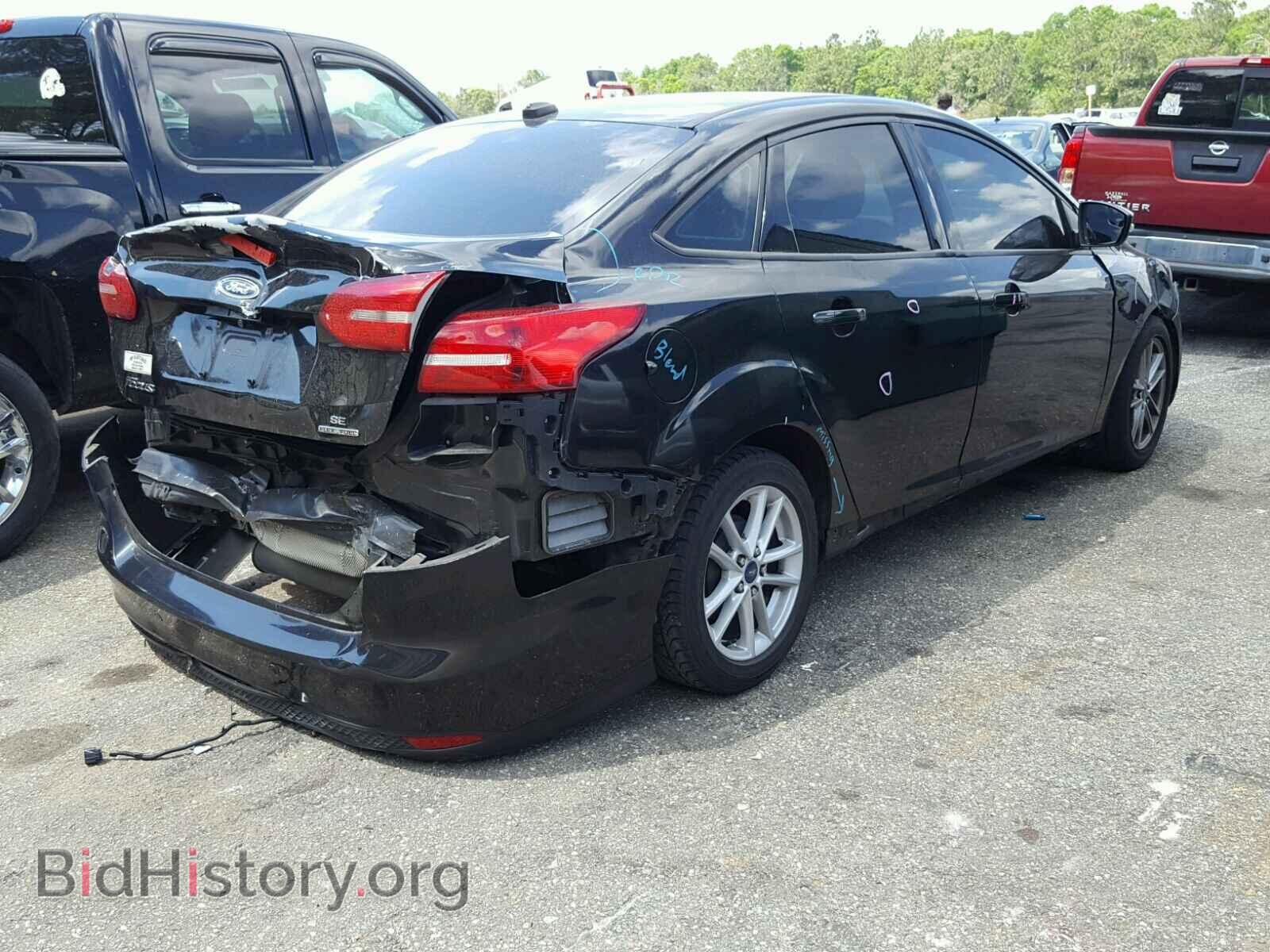 2015 FORD FOCUS - VIN: 1FADP3F25FL215488 - Photo 4