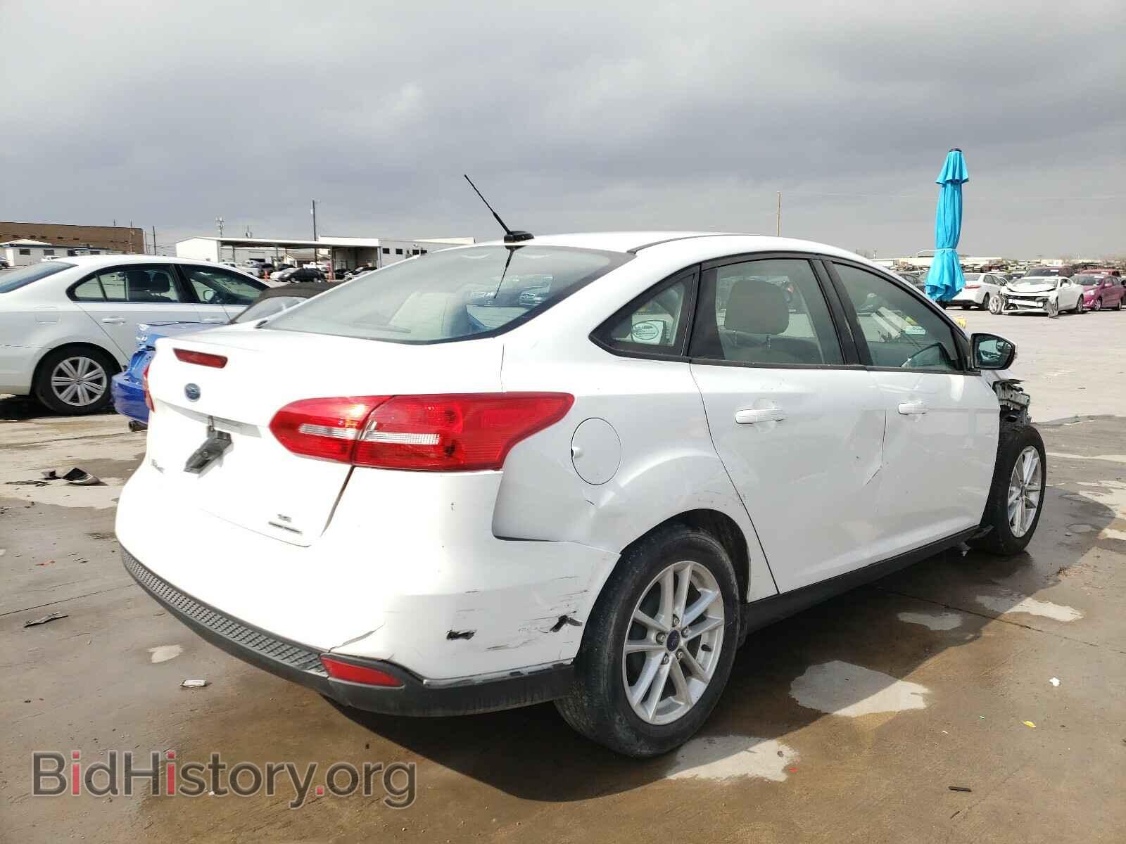 2015 FORD FOCUS - VIN: 1FADP3F23FL374624 - Photo 4