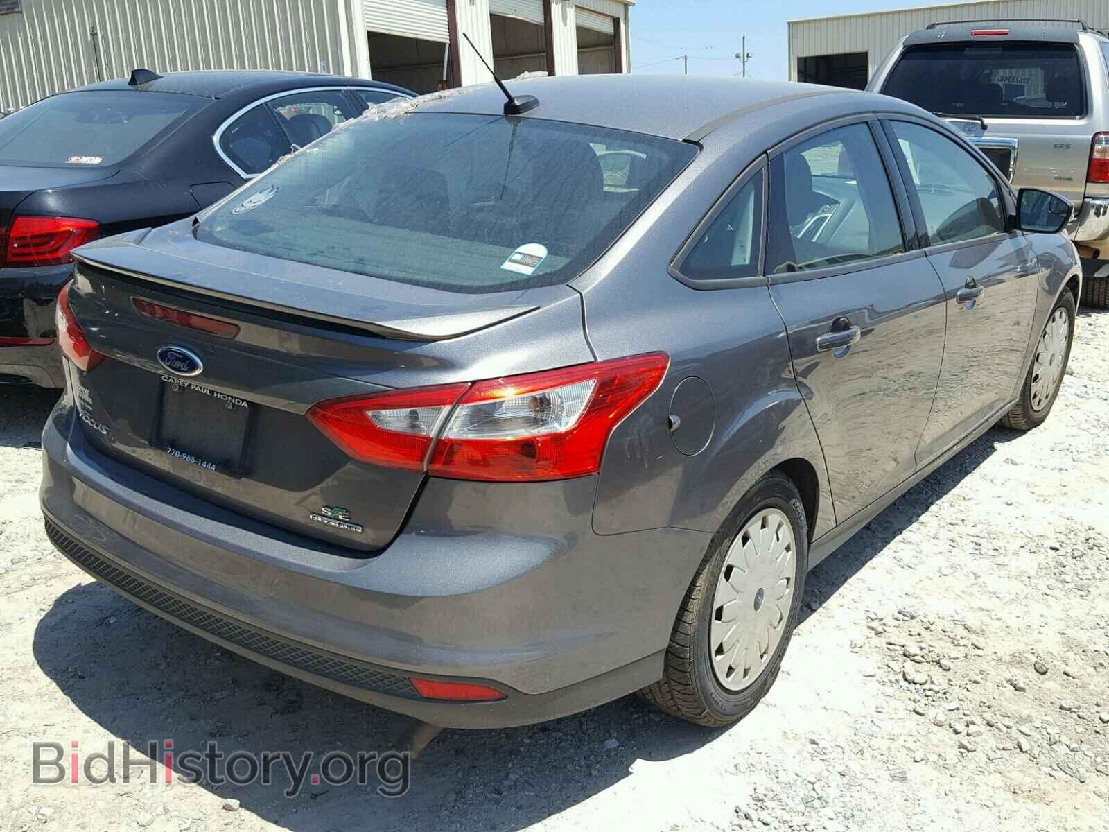 2014 FORD FOCUS - VIN: 1FADP3F20EL102675 - Photo 4