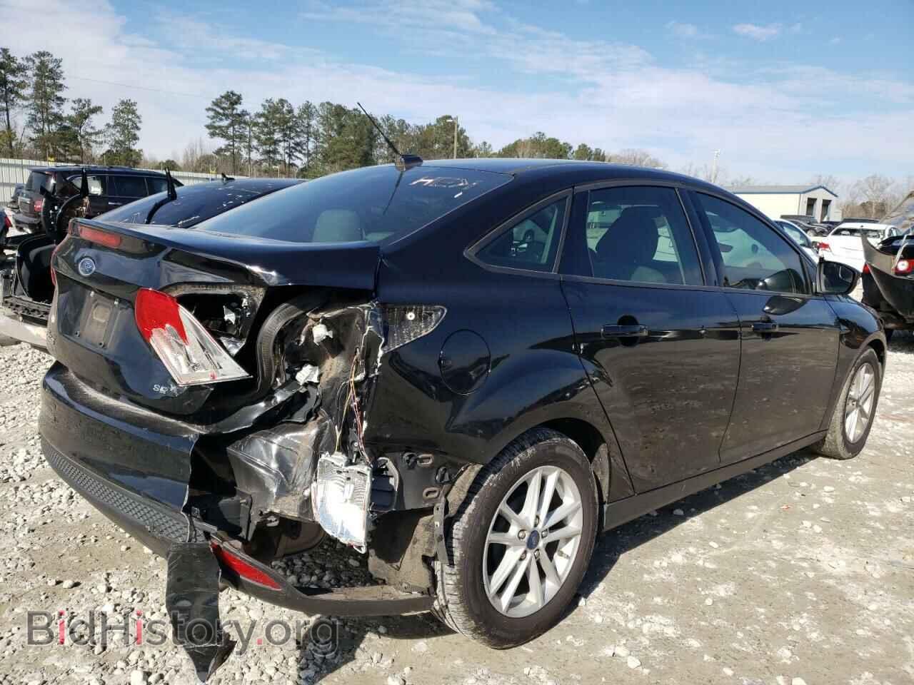 2017 FORD FOCUS - VIN: 1FADP3F21HL322203 - Photo 4