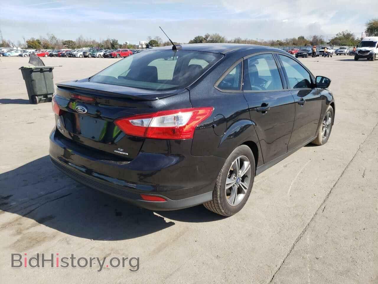 2014 FORD FOCUS - VIN: 1FADP3F20EL285575 - Photo 4