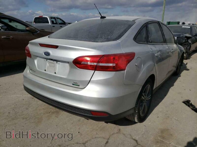 2016 Ford FOCUS (VIN 1FADP3FE8GL318108) — photo 4 of 10