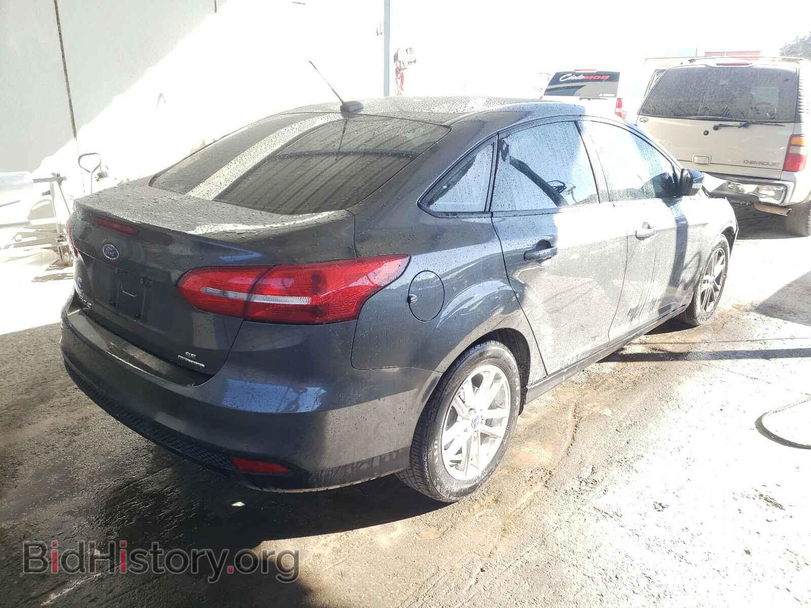 2015 FORD FOCUS - VIN: 1FADP3F24FL316313 - Photo 4