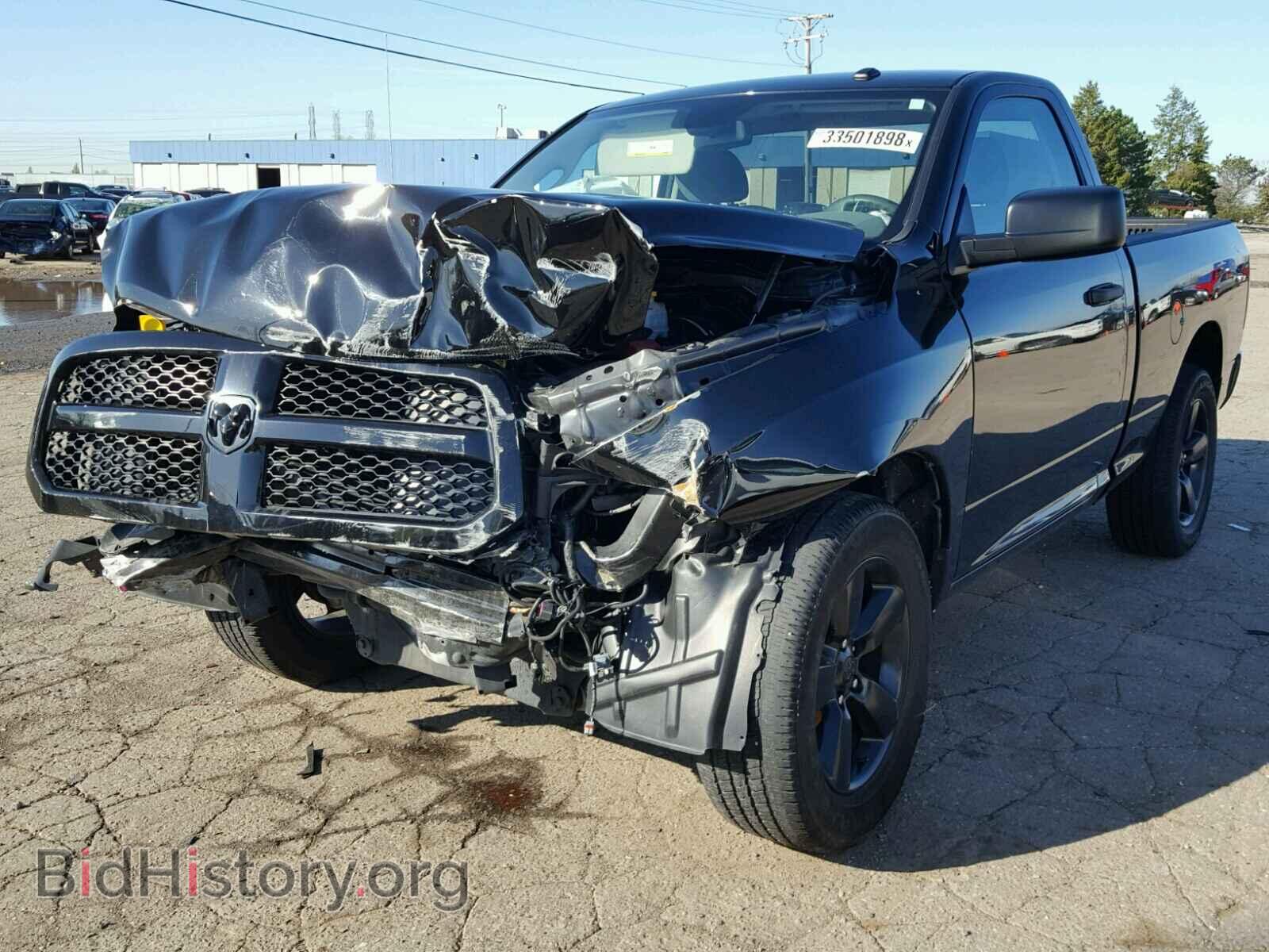 2014 RAM 1500 ST - VIN: 3C6JR7AT6EG259727 - Фото 2
