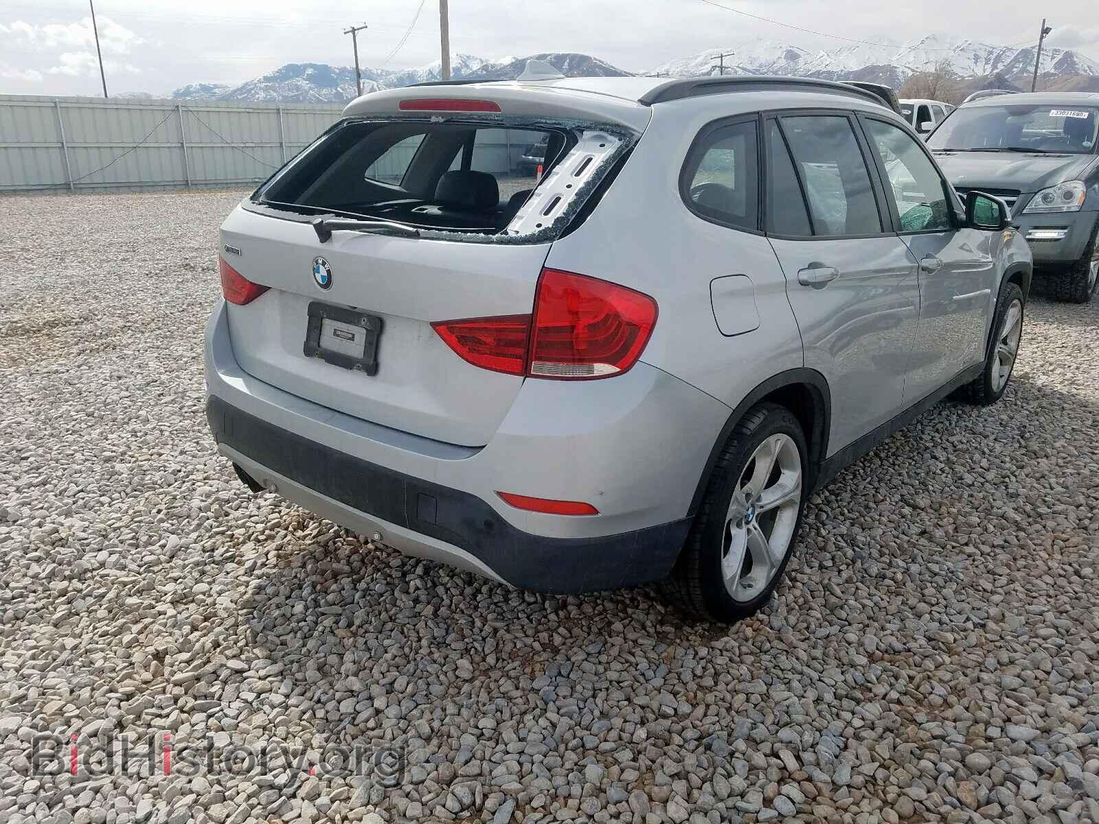 2014 BMW X1 - VIN: WBAVM5C52EVV92717 - Фото 4